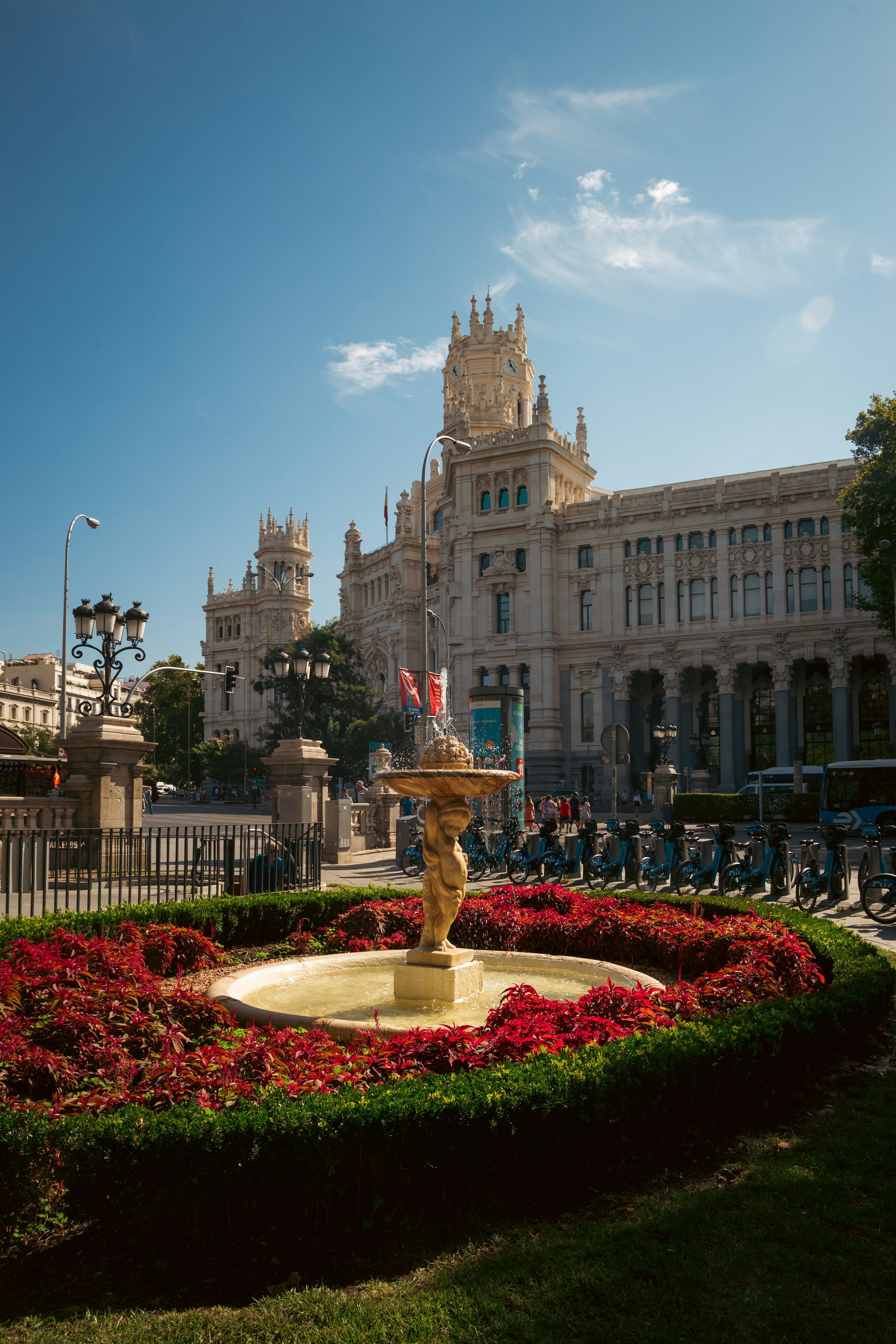 3000x4500 Fountain with flowers in front of ornate building