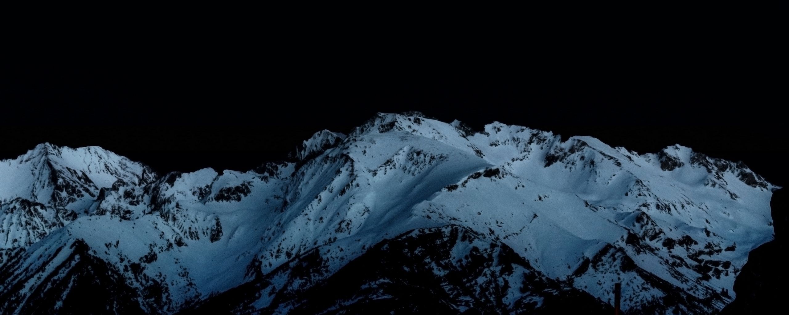2560x1024 Download wallpaper 2560x1024 night, mountains, snowy, peaks ultrawide monitor HD background
