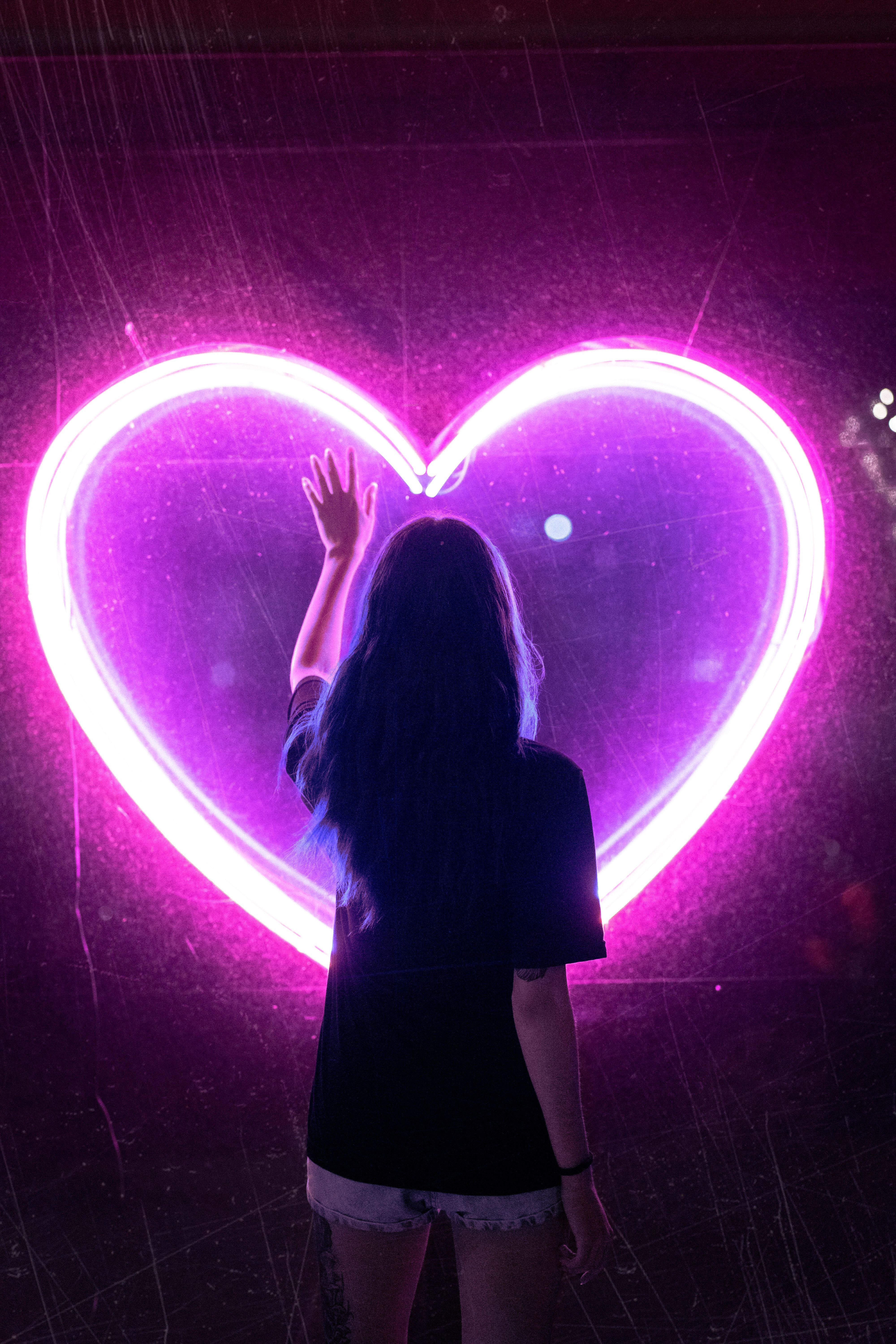 4000x6000 Woman in Front of Heart Shape Neon · Free