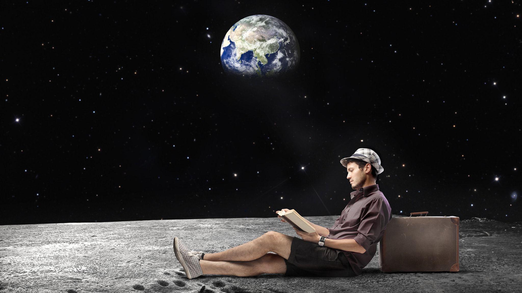 2048x1152 Reading on The Moon Free HD Wallpaper