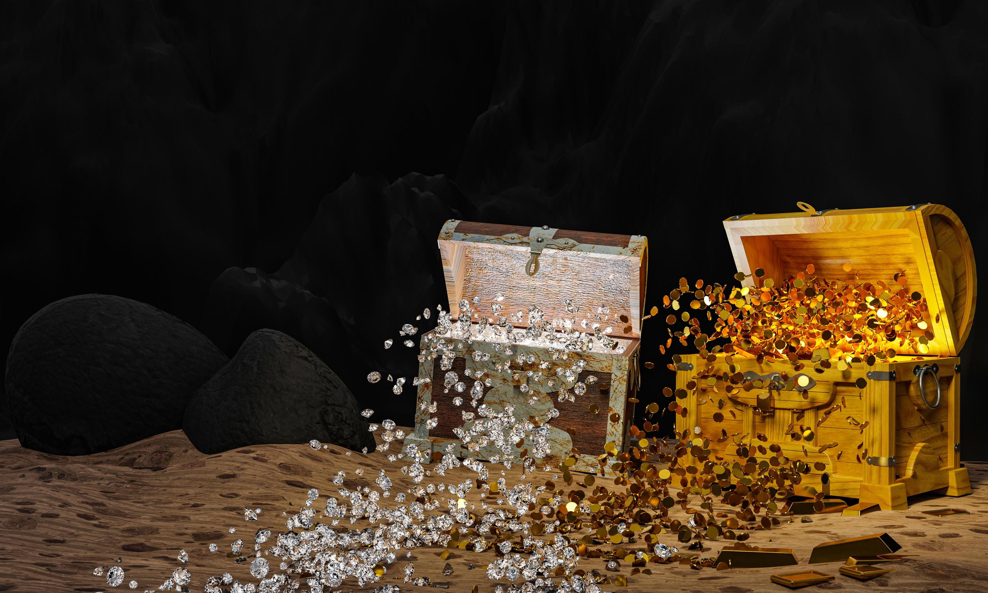 3267x1960 Gold coins and diamonds scatter or bounce off the treasure chest onto the sand with rocks and cliffs as a background. 3D Rendering