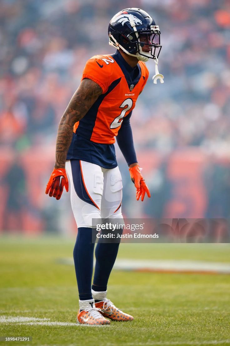 736x1103 Cornerback Pat Surtain II of the Denver Broncos lines up during the