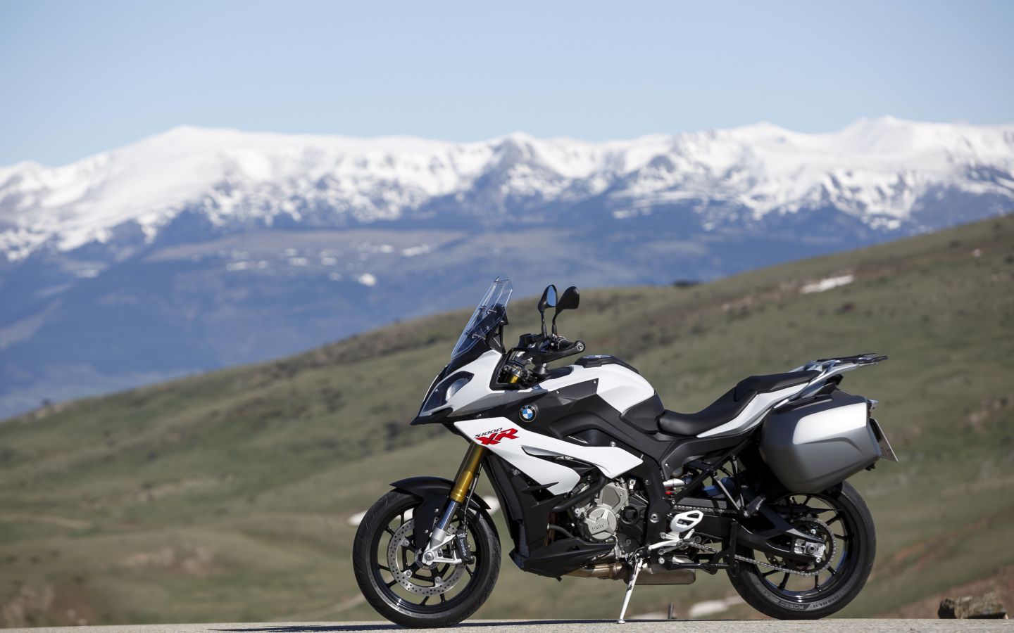 1440x900 Motorcycle BMW S1000 XR On The Background Of Snow Capped Mountains Desktop Wallpaper 1440x900