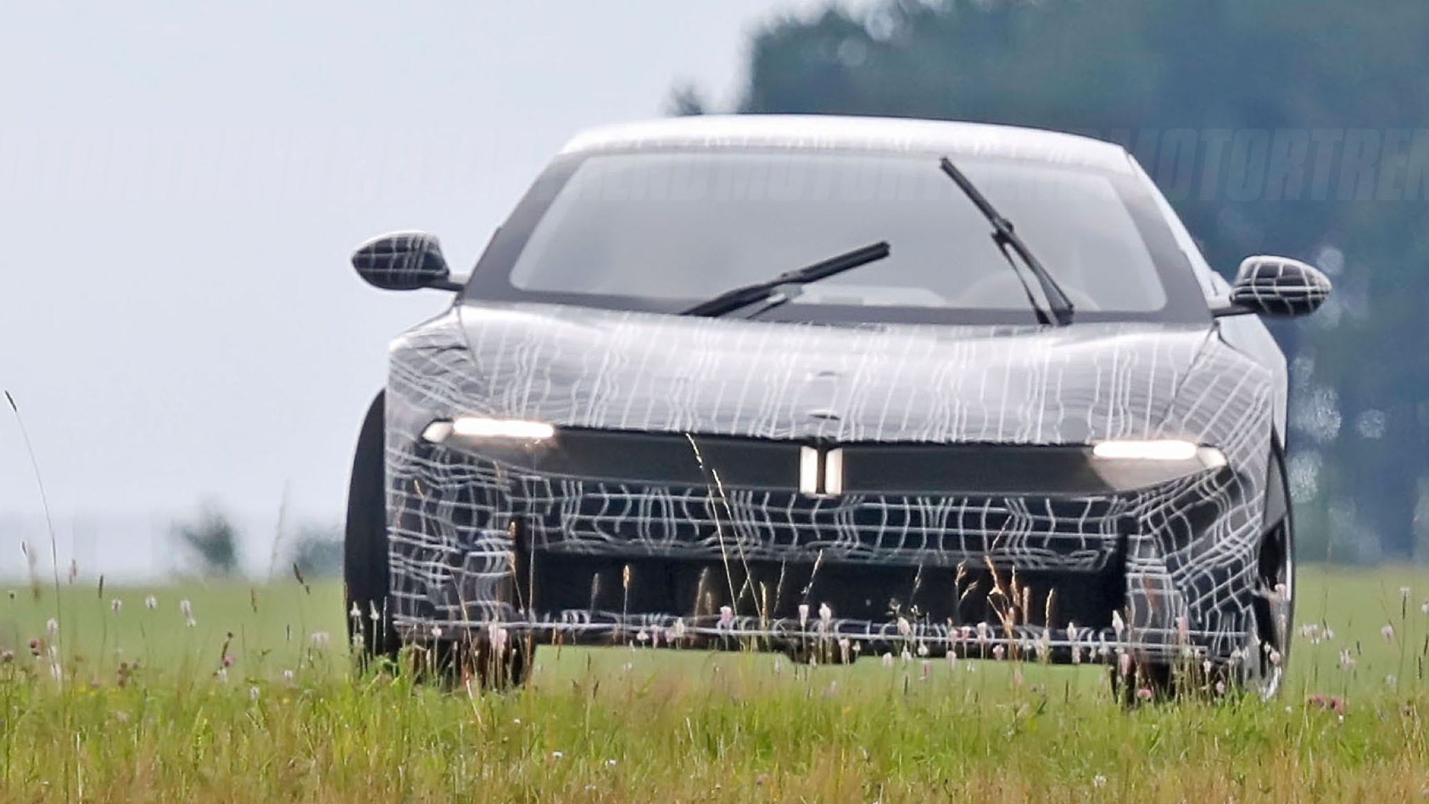 2048x1152 BMW's Rad Wedgy Supercar Is Hiding Under This Camo—Here's What We Know