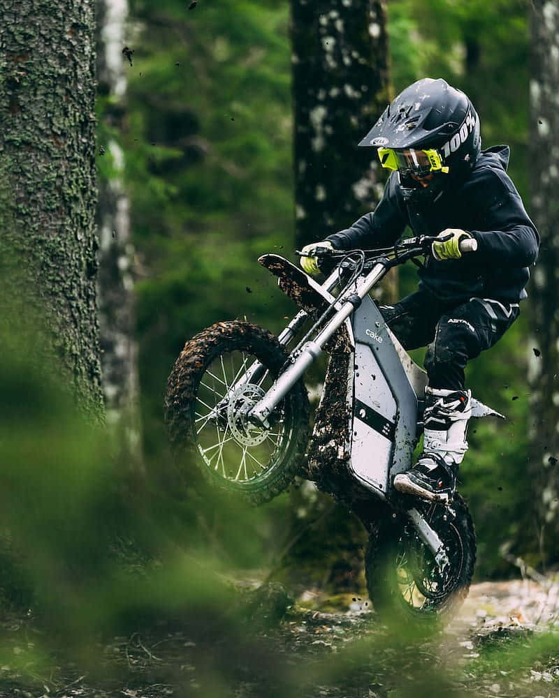 800x1000 Download Stylish Electric Bike Enjoying Nature Wallpaper
