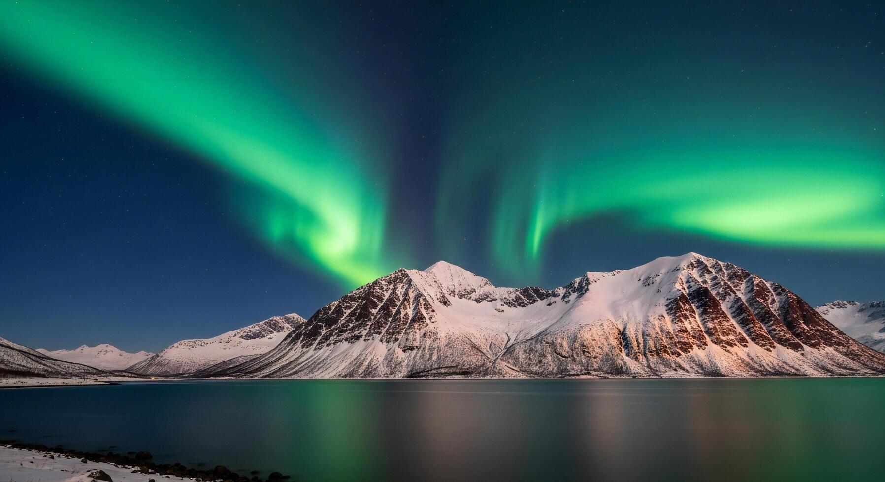 1797x980 Nature background, Nature wallpaper, Vibrant green aurora borealis illuminates snow capped mountains reflecting in a calm lake under a starry night sky