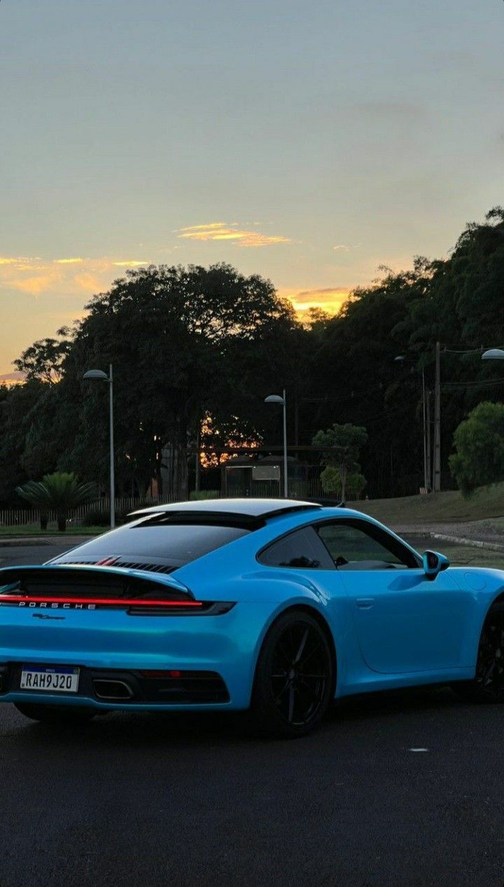 720x1266 Miami blue porsche wallpaper. Porsche headlight wallpaper, Aesthetic porshe wallpaper, Dream car