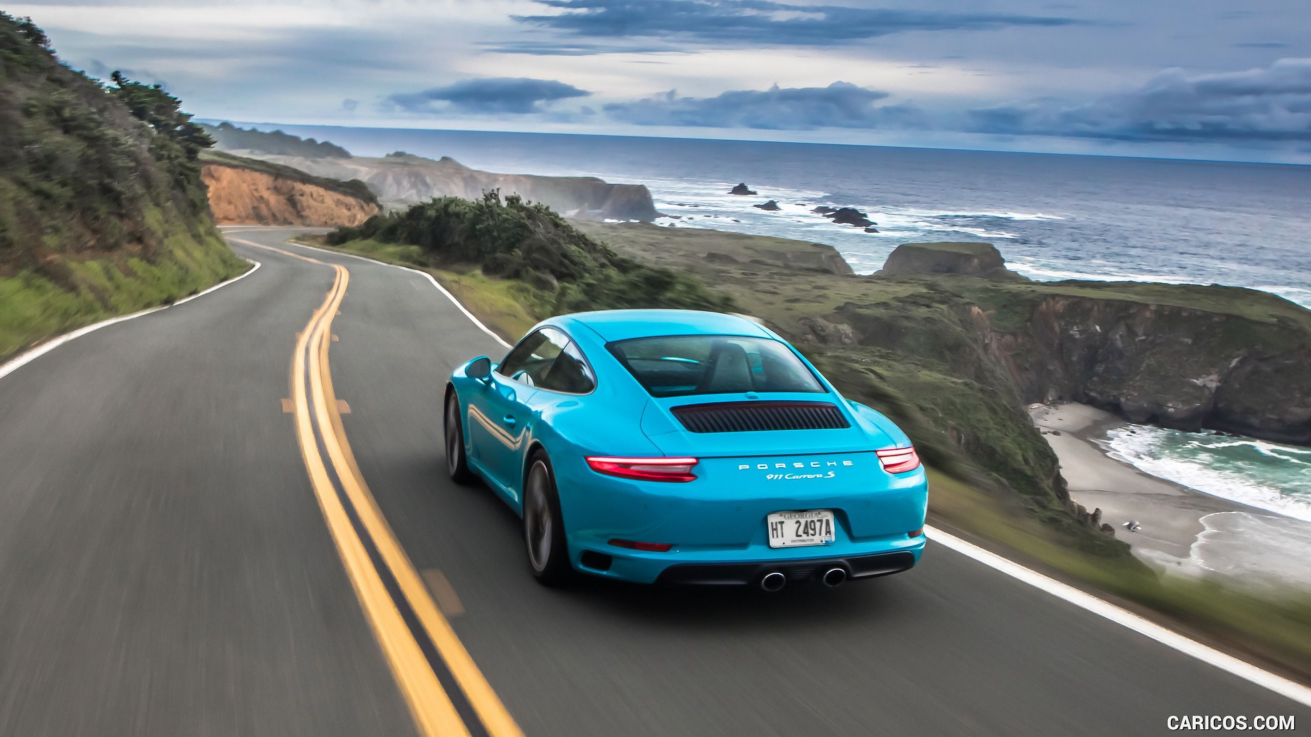 2560x1440 Miami Blue Porsche Wallpaper