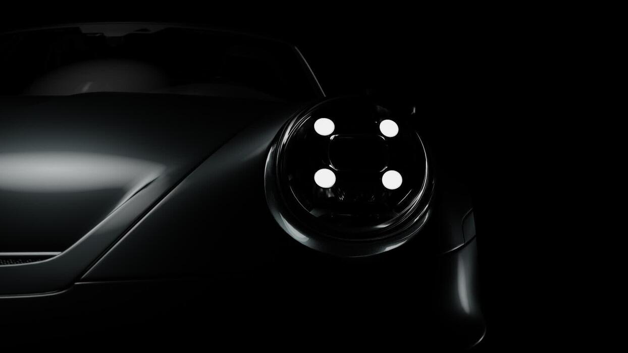 1244x700 The Headlight Of A Sports Car In Close Up, Illuminated By Dynamic Light, Forming Beautiful Highlights On The Body