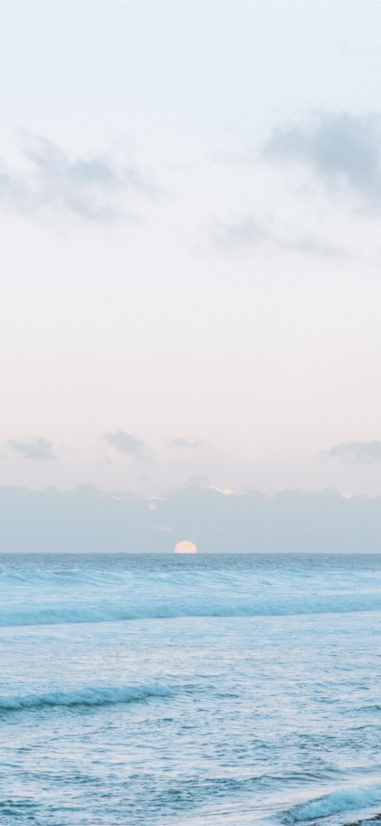 1242x2688 sunset in a beautiful island iPhone SE Wallpaper Free Download