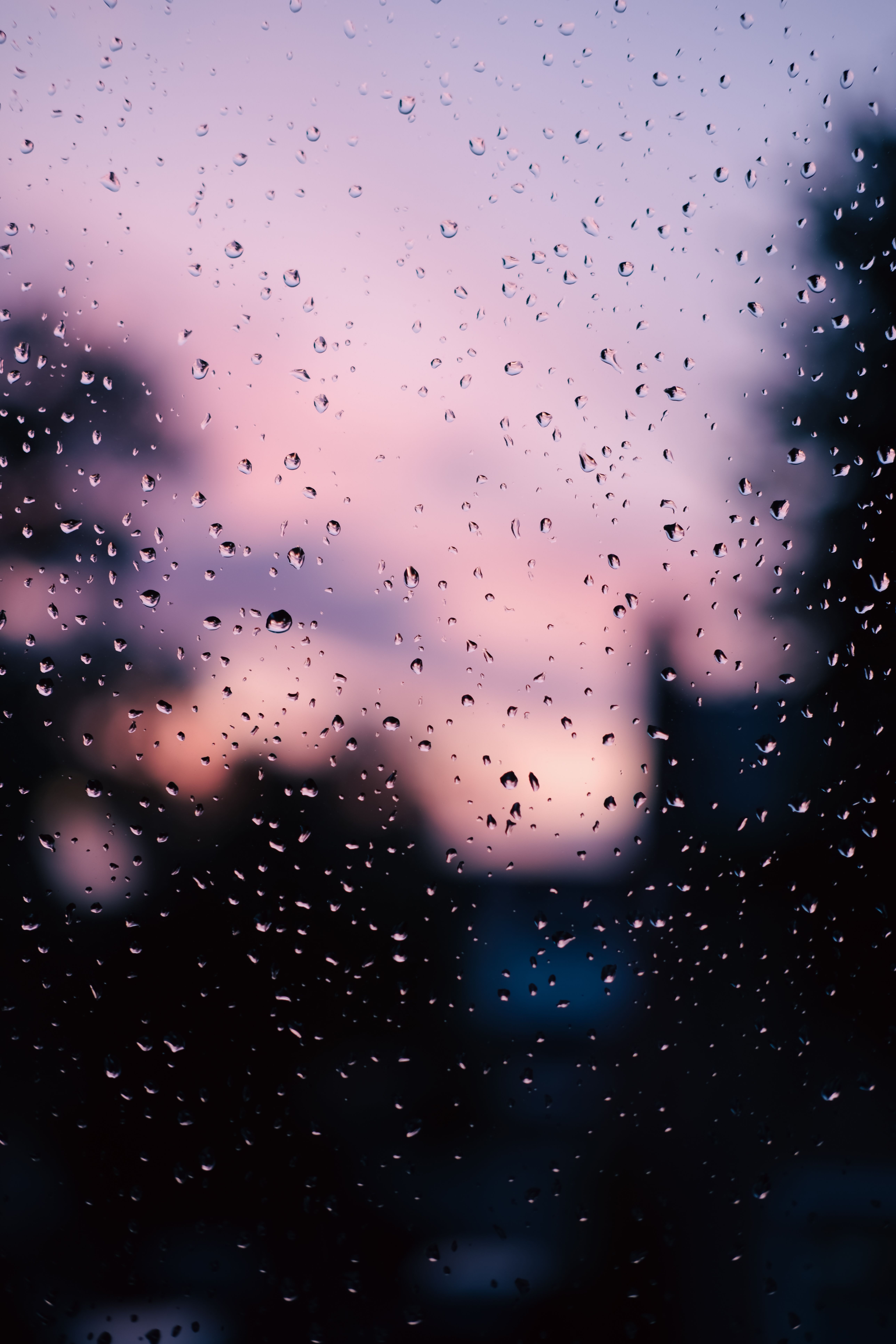 5152x7728 Rain on Window with Vibrant Sunset Background · Free
