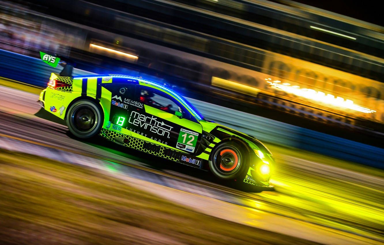 1332x850 Download Green Auto Racing Car Wallpaper