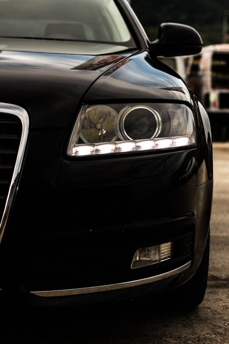 736x1104 Black Audi A6 Quattro Parked in Parking Lot. Motosikletler, Motorlar, Otomobil