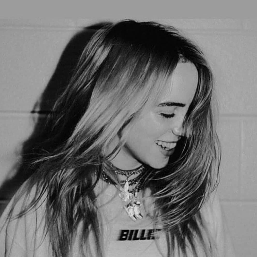 1063x1063 Download Aesthetic Billie Eilish Smiling Black And White Wallpaper