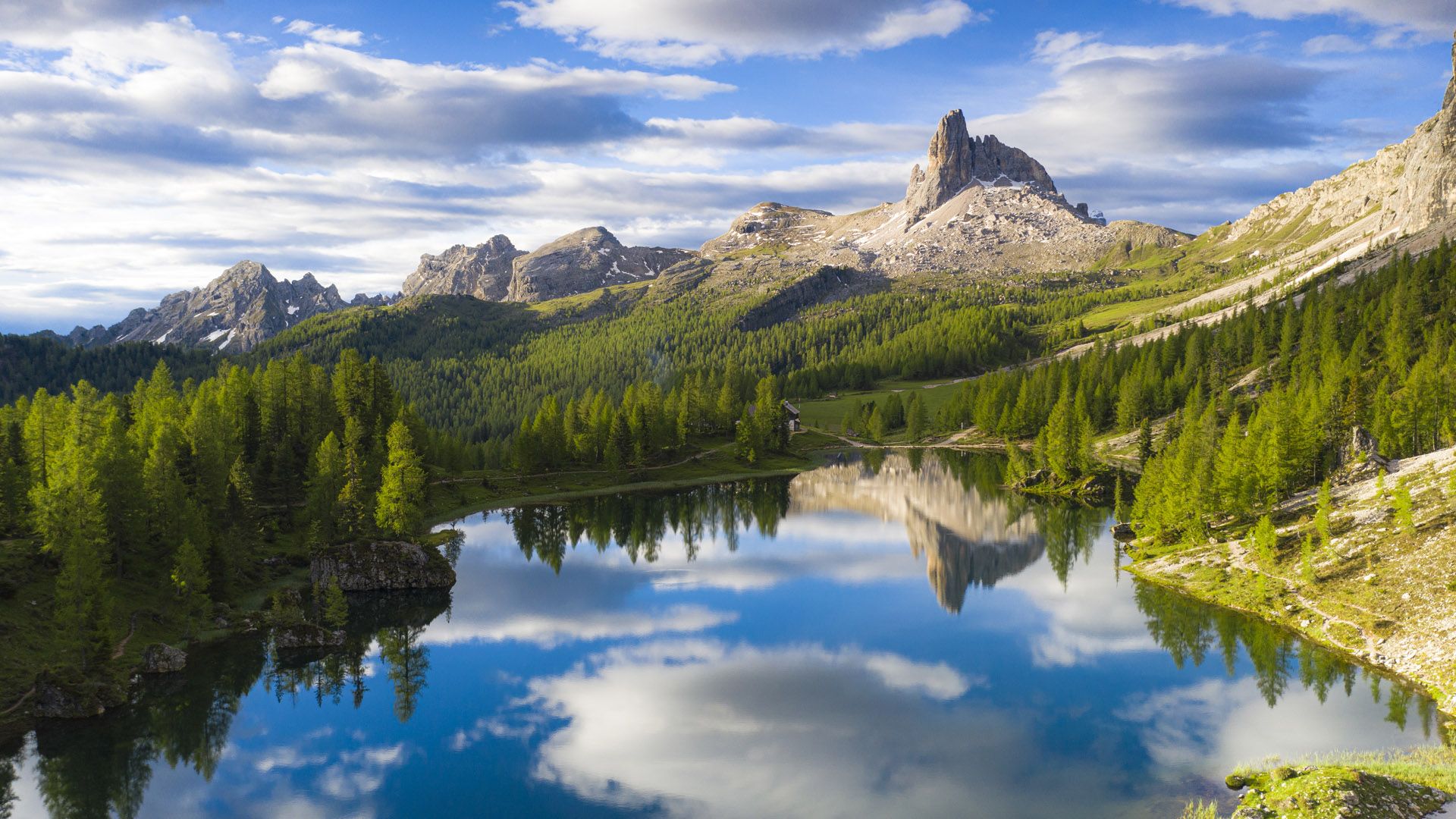 1920x1080 Becco di Mezzodi reflected in Lake Federa, Ampezzo Dolomites, Belluno, Veneto, Italy. Windows Spotlight Image