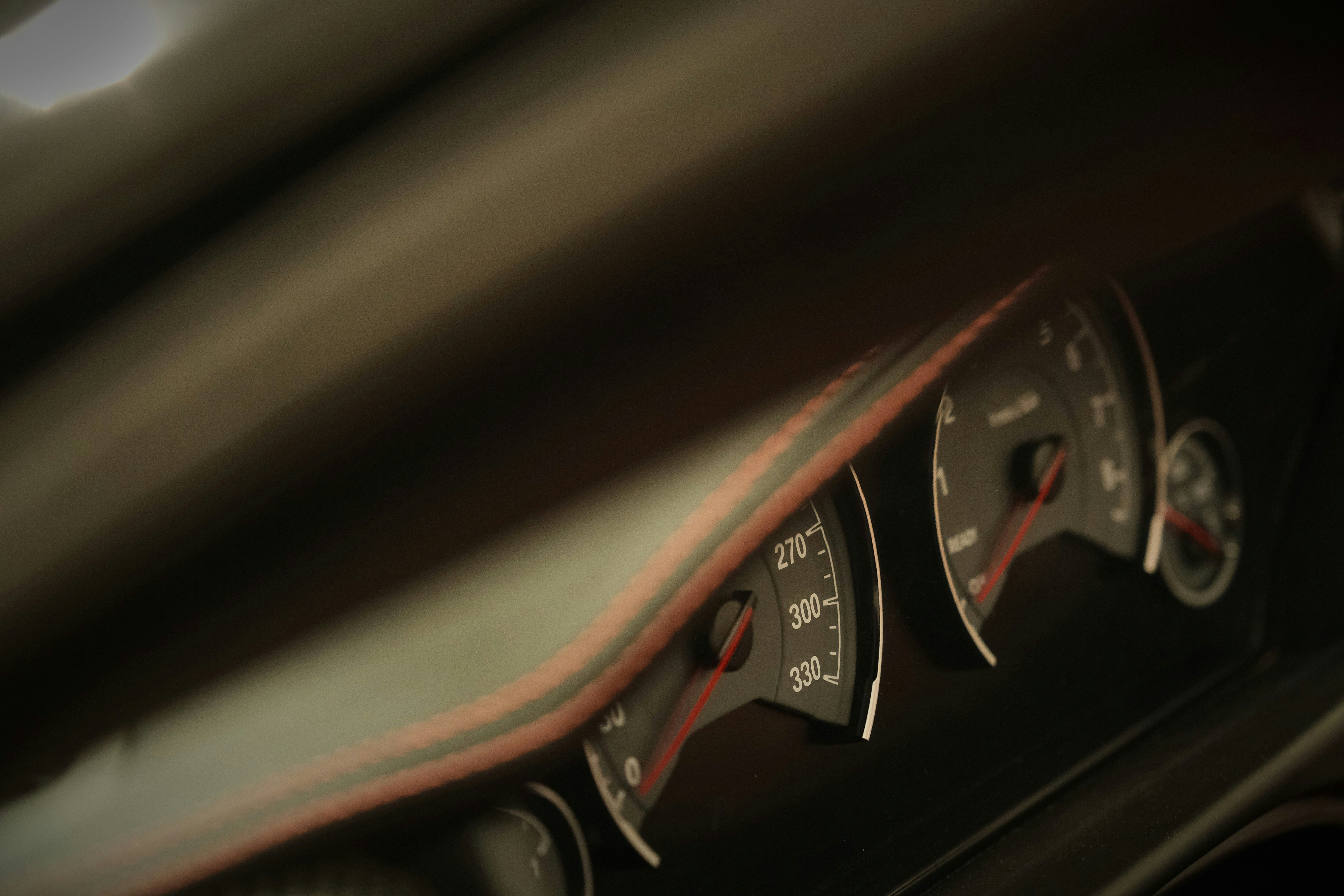 6240x4160 The dashboard of a car in the dark