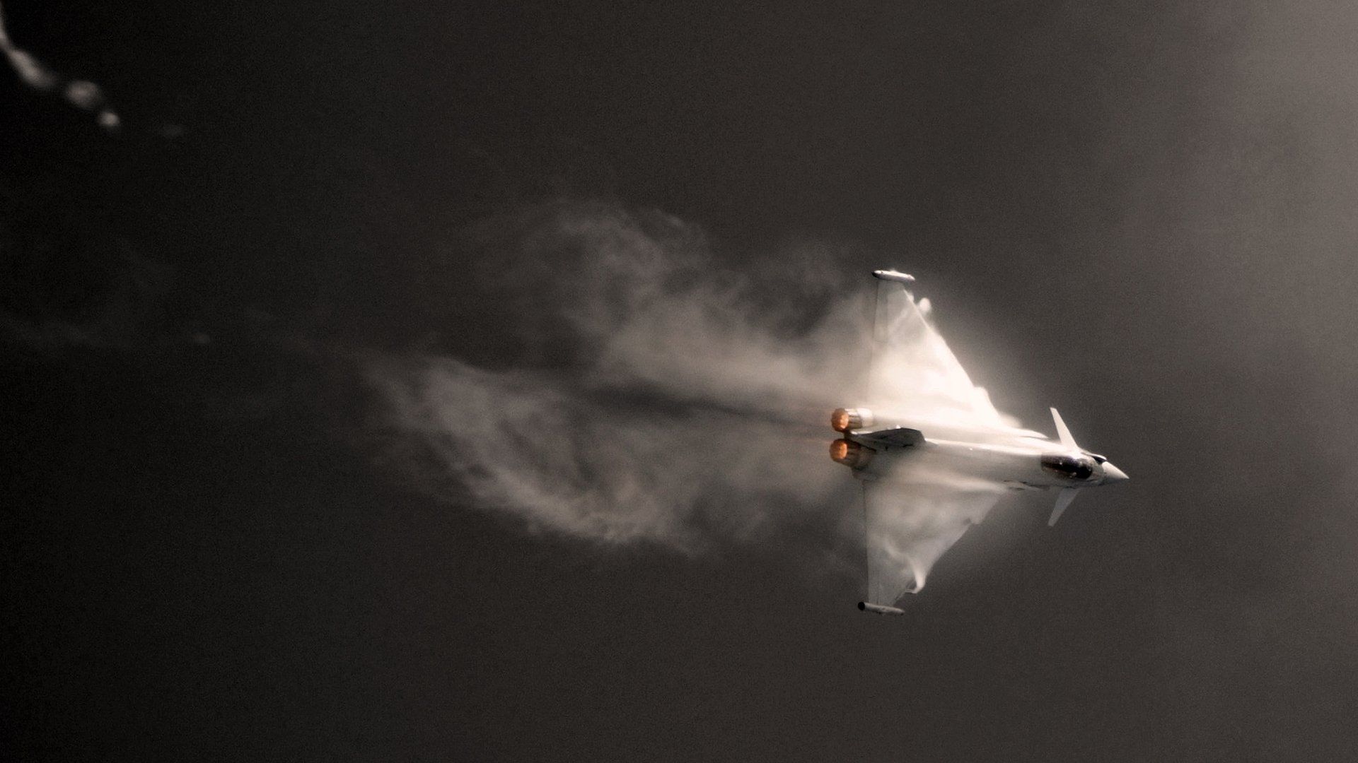 1920x1080 Strike Wings: HD Wallpaper of a Jet Fighter in Actionx1080
