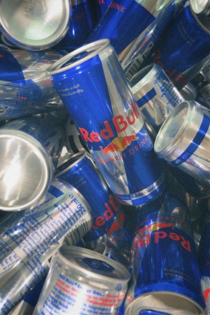 736x1104 Vintage Red Bull Cans Wallpaper. Blue and silver energy drinks, Energy drink storage ideas, Party drink setup inspiration