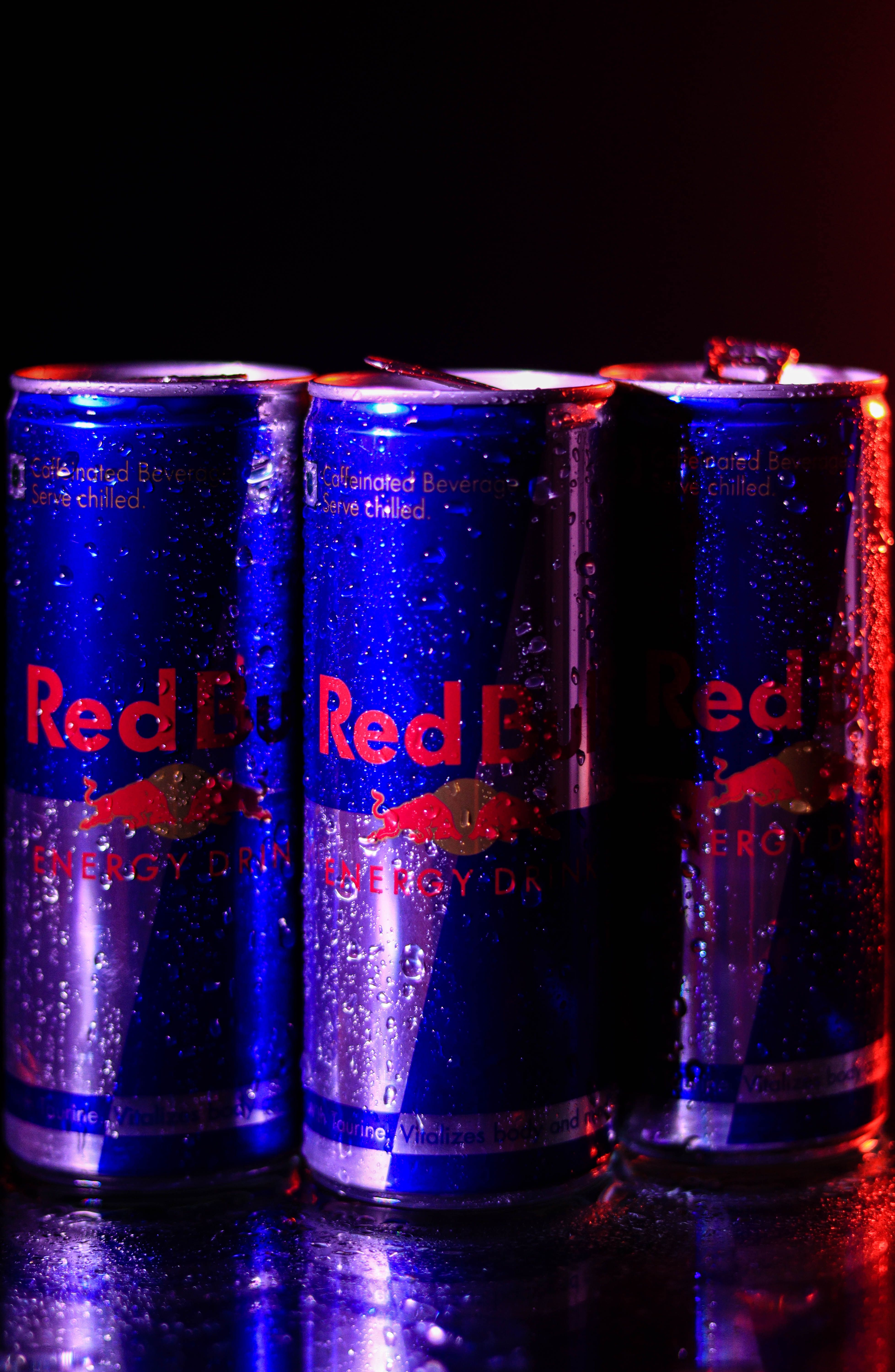 3913x5999 Close up of Red Bull Cans · Free