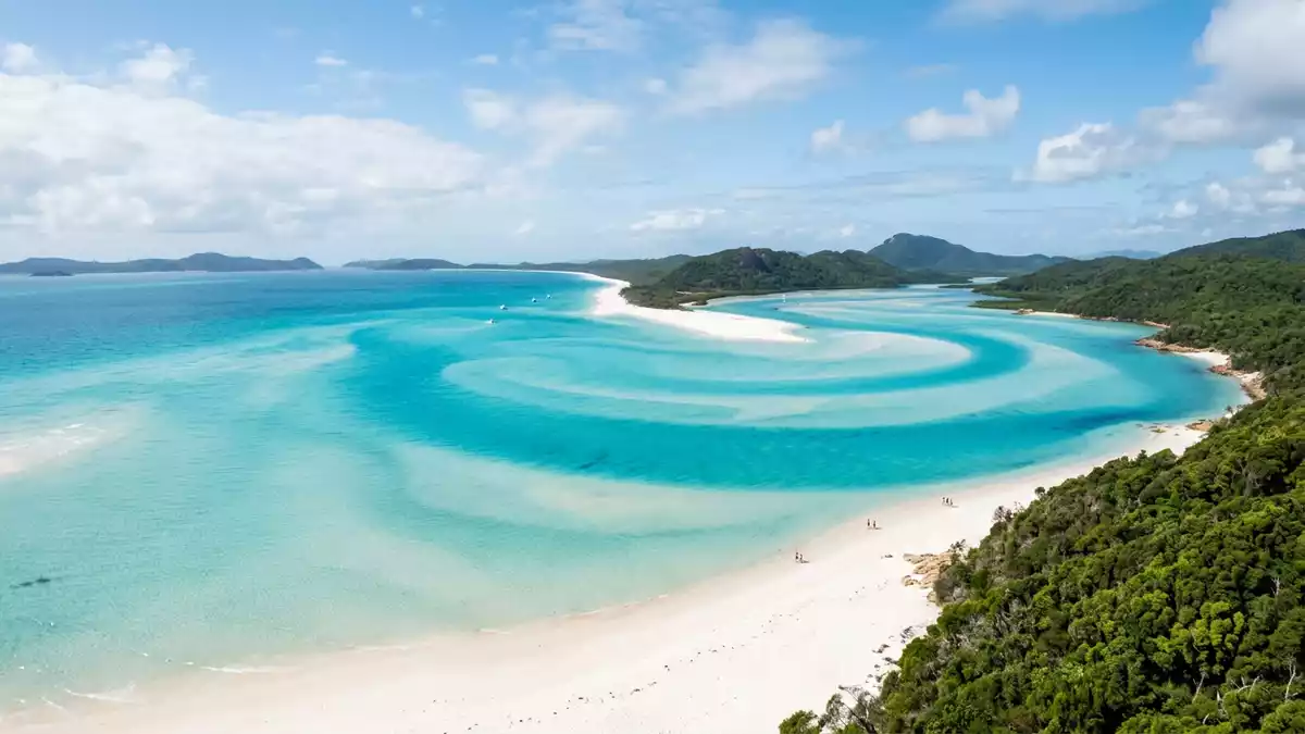 1200x675 Whitehaven Beach and its long arc of white silica sand