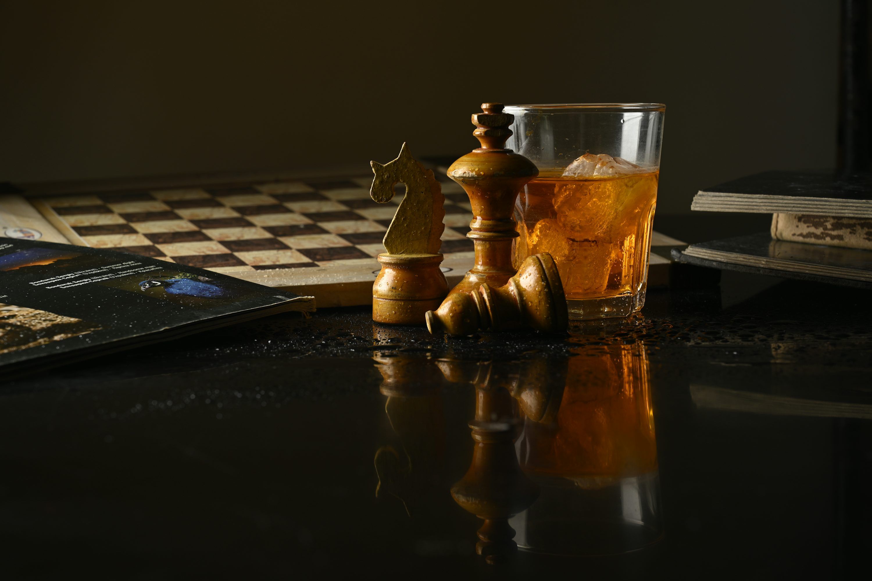 3000x2000 Chess pieces and a drink on a reflective dark surface