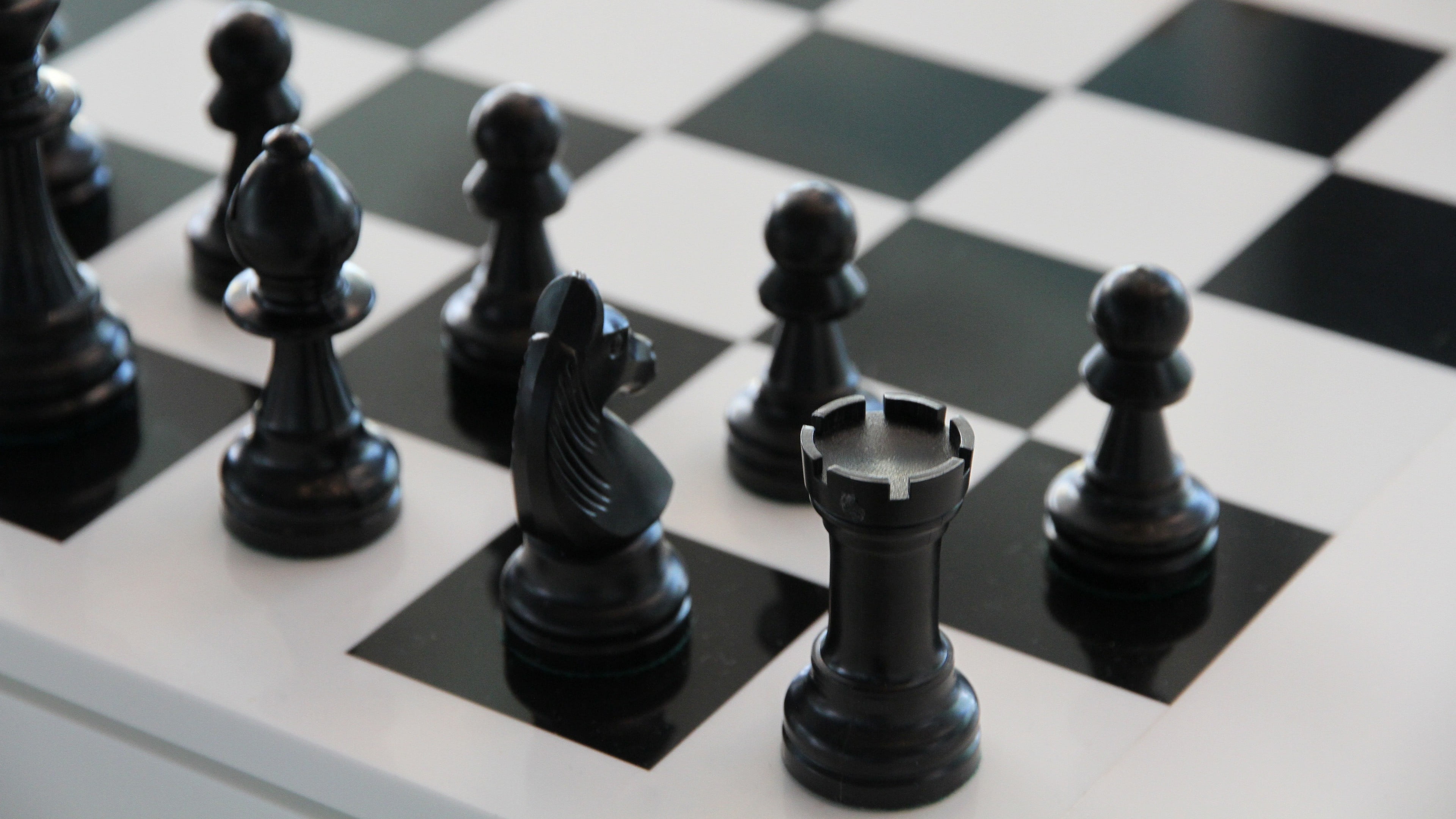 3840x2160 Several black chess pieces, chess, black HD wallpaper