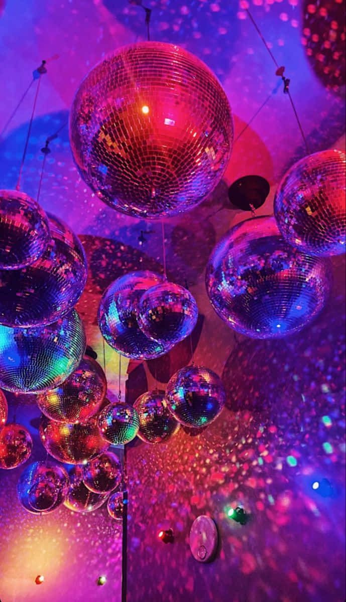 689x1200 Download Vibrant Disco Ball Celebration Wallpaper