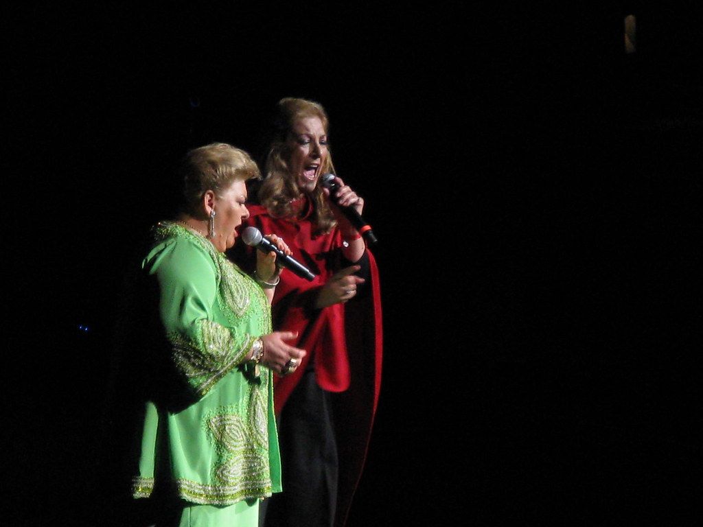 1024x768 Paquita La Del Barrio singing with her sister Amph