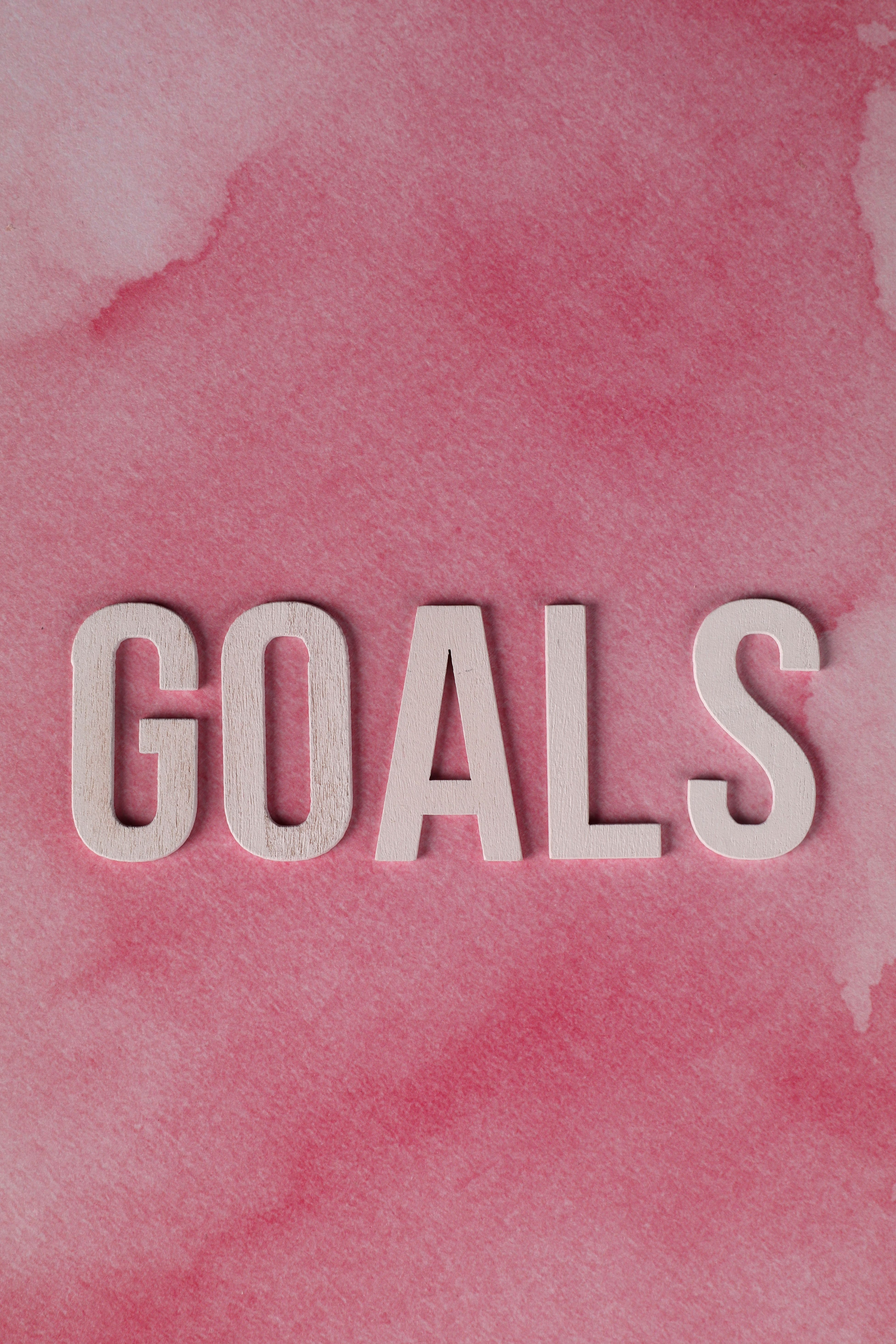 3903x5854 Inspiring Pink Goals Text on Watercolor Background · Free