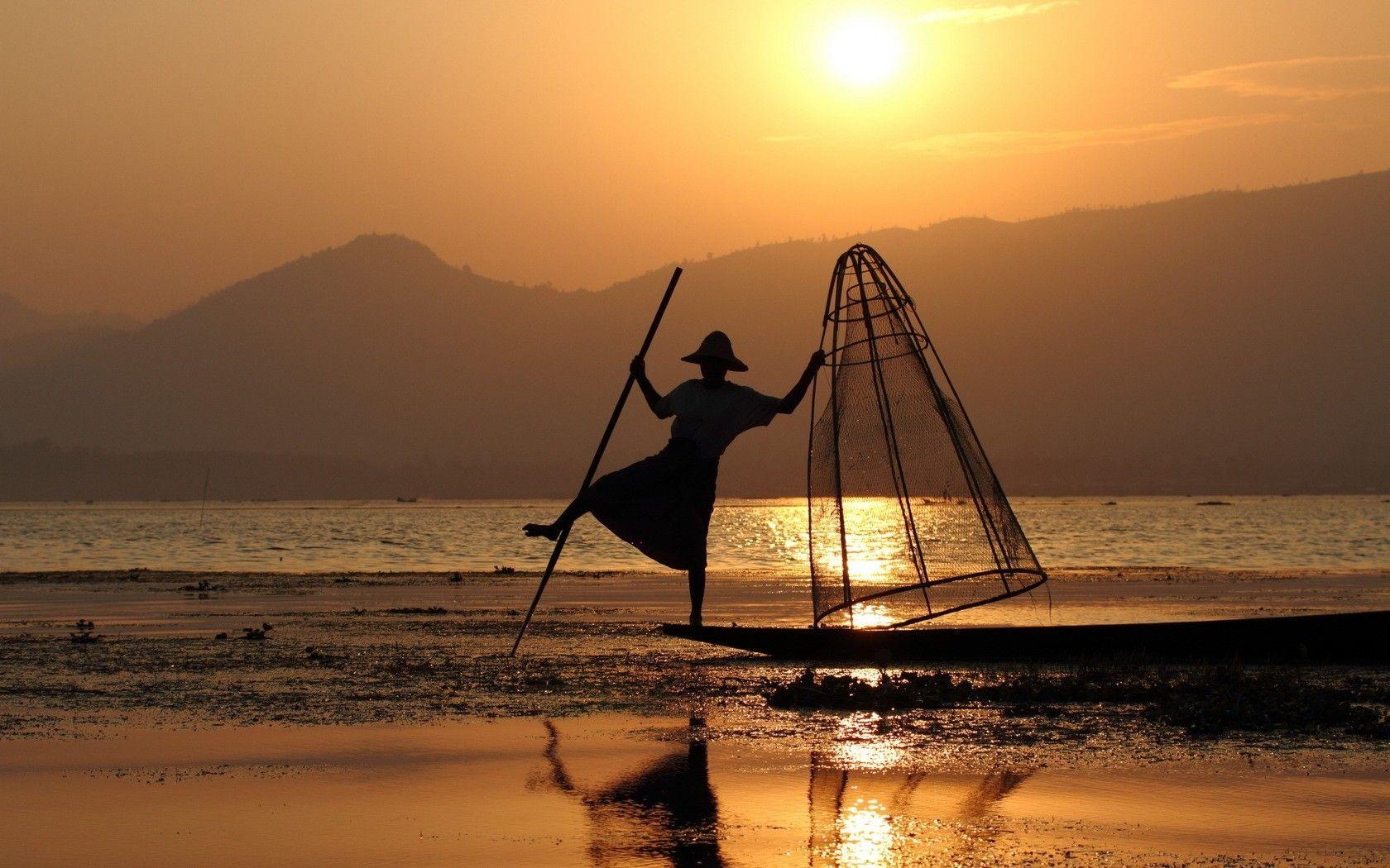 1680x1050 Oriental Sunset Beach Nature Man Beautiful Desktop Wallpaper