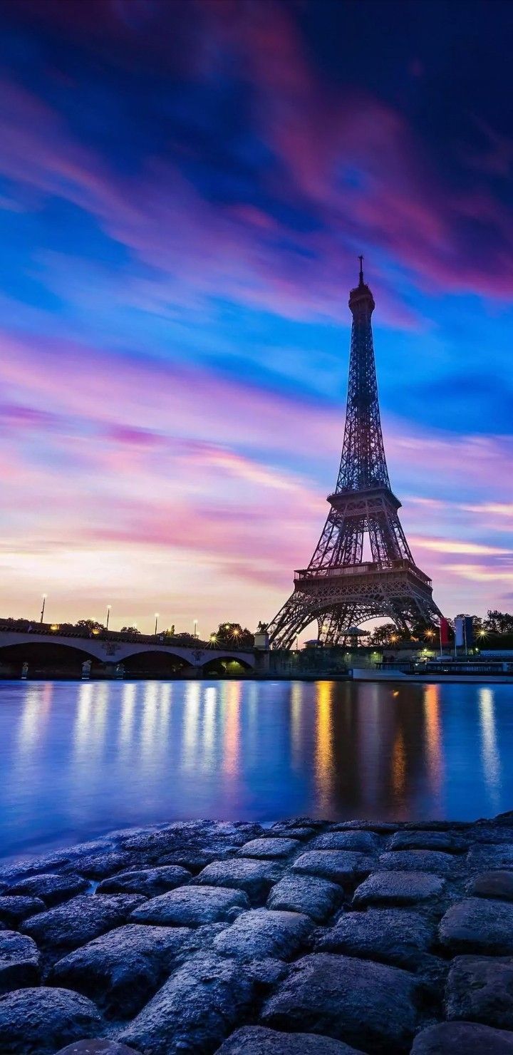 720x1480 The Eiffel Tower at Night. Eiffel tower blue and pink, Paris tower eiffel, Colorful sky eiffel tower view