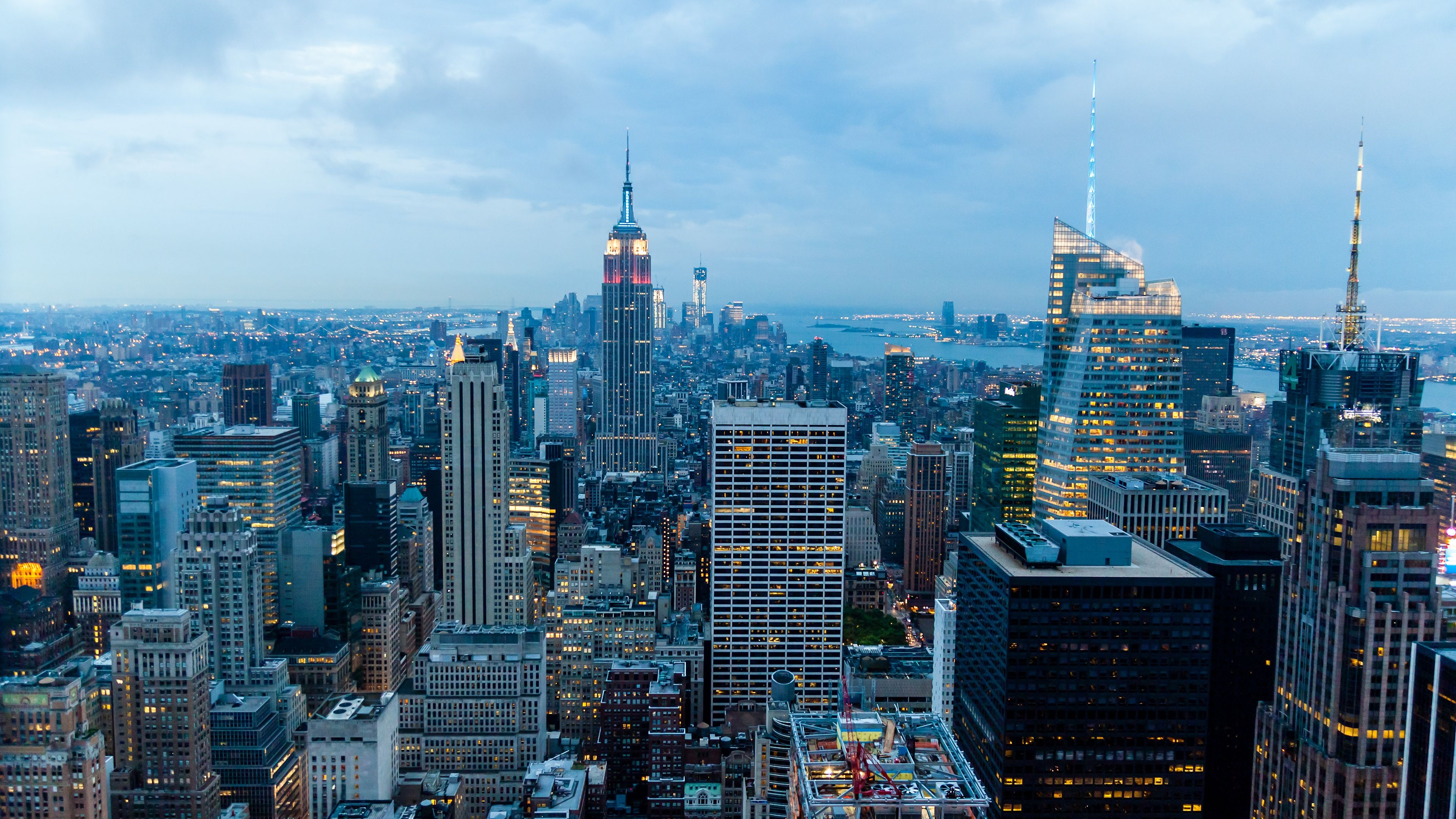 3840x2160 New York City Wallpaper 4K, Cityscape, City lights, Sunset