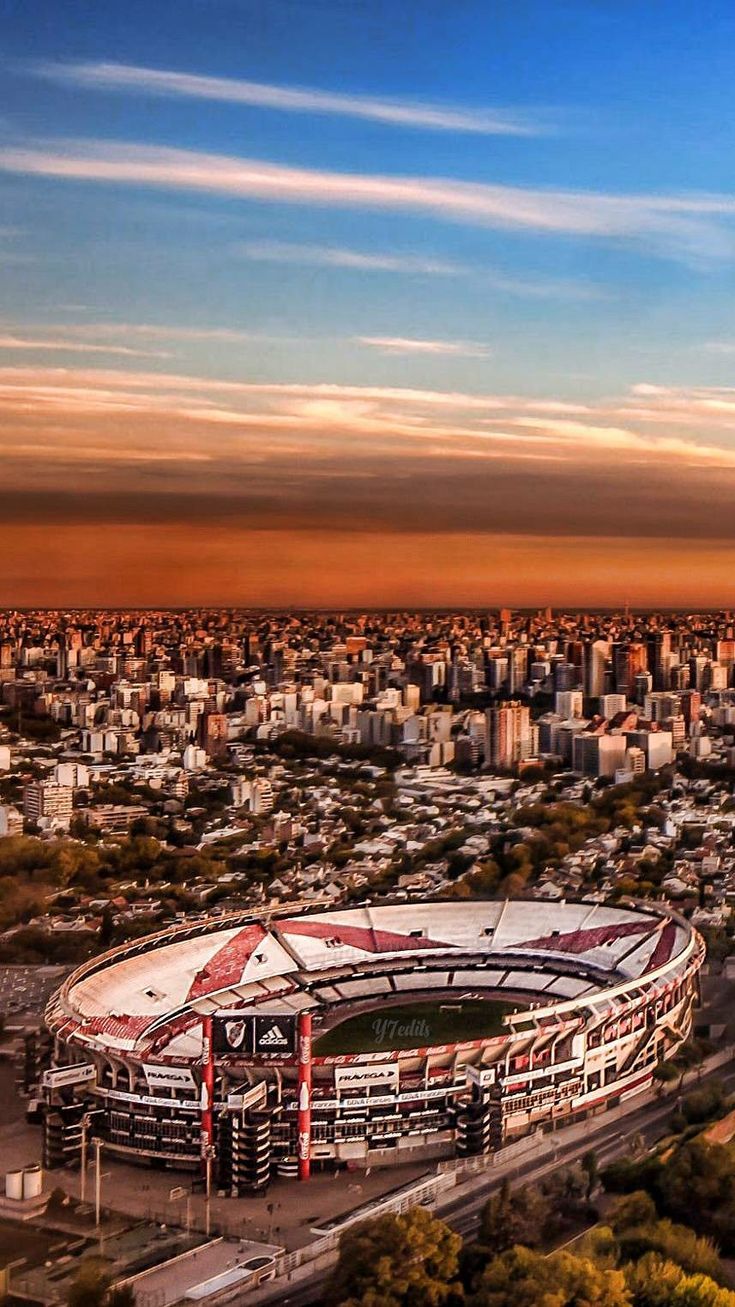 735x1307 Club Atlético River Plate, Argentina. River with stadium in background, River plate stadium sunset view