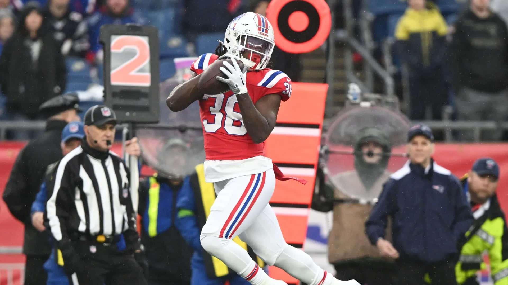 1920x1080 Download Rhamondre Stevenson Football Game Action Wallpaper