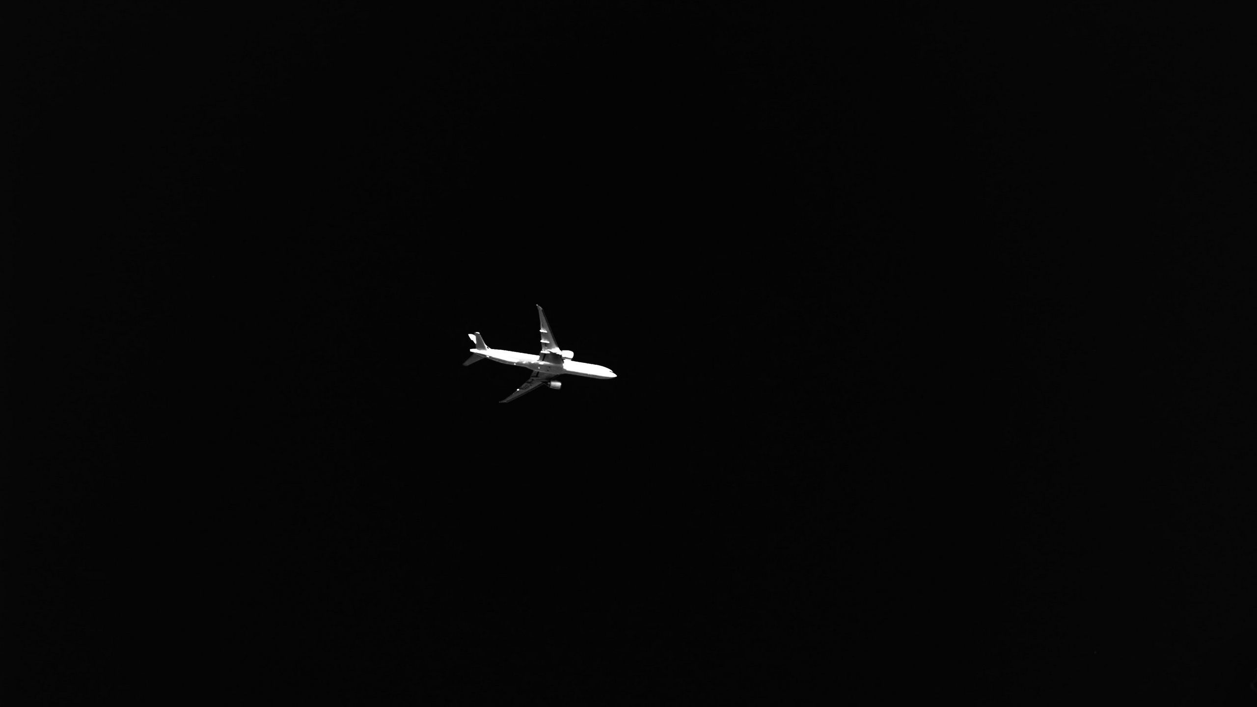 2560x1440 Download wallpaper 2560x1440 airplane, sky, bw, dark, minimalism widescreen 16:9 HD background
