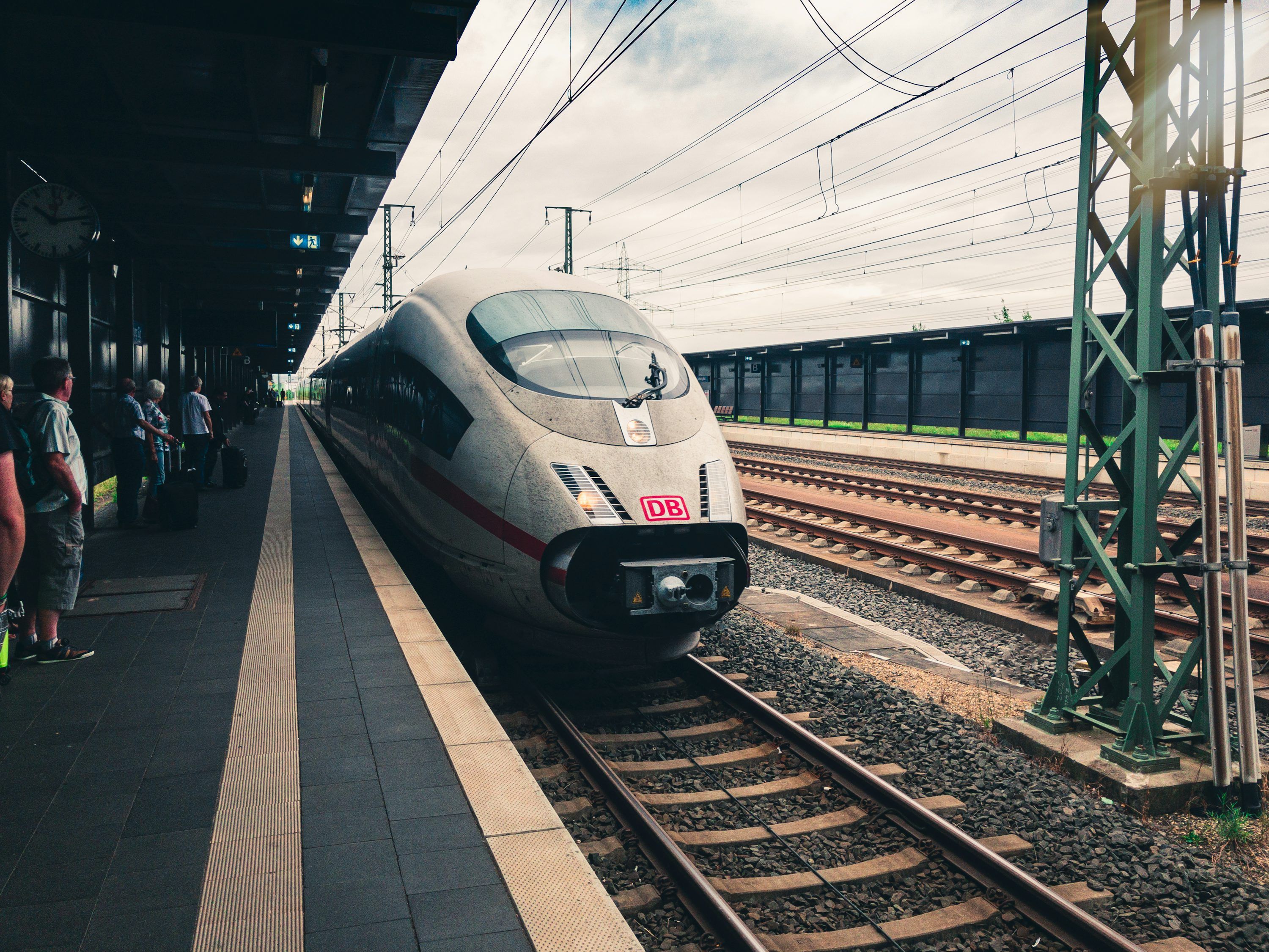 3000x2250 White and black train on rail way during daytime