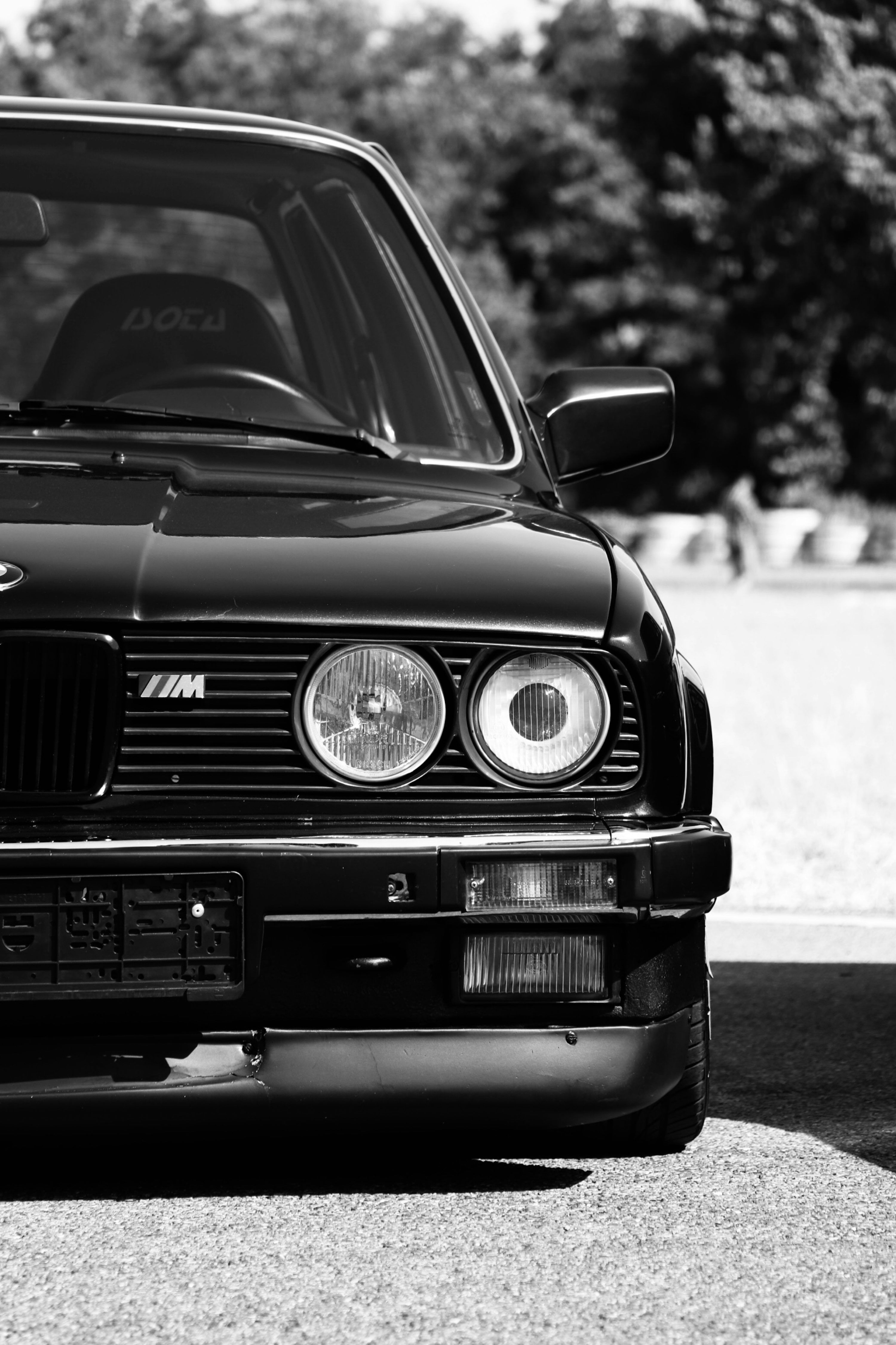 3000x4500 A black and white photo of a bmw