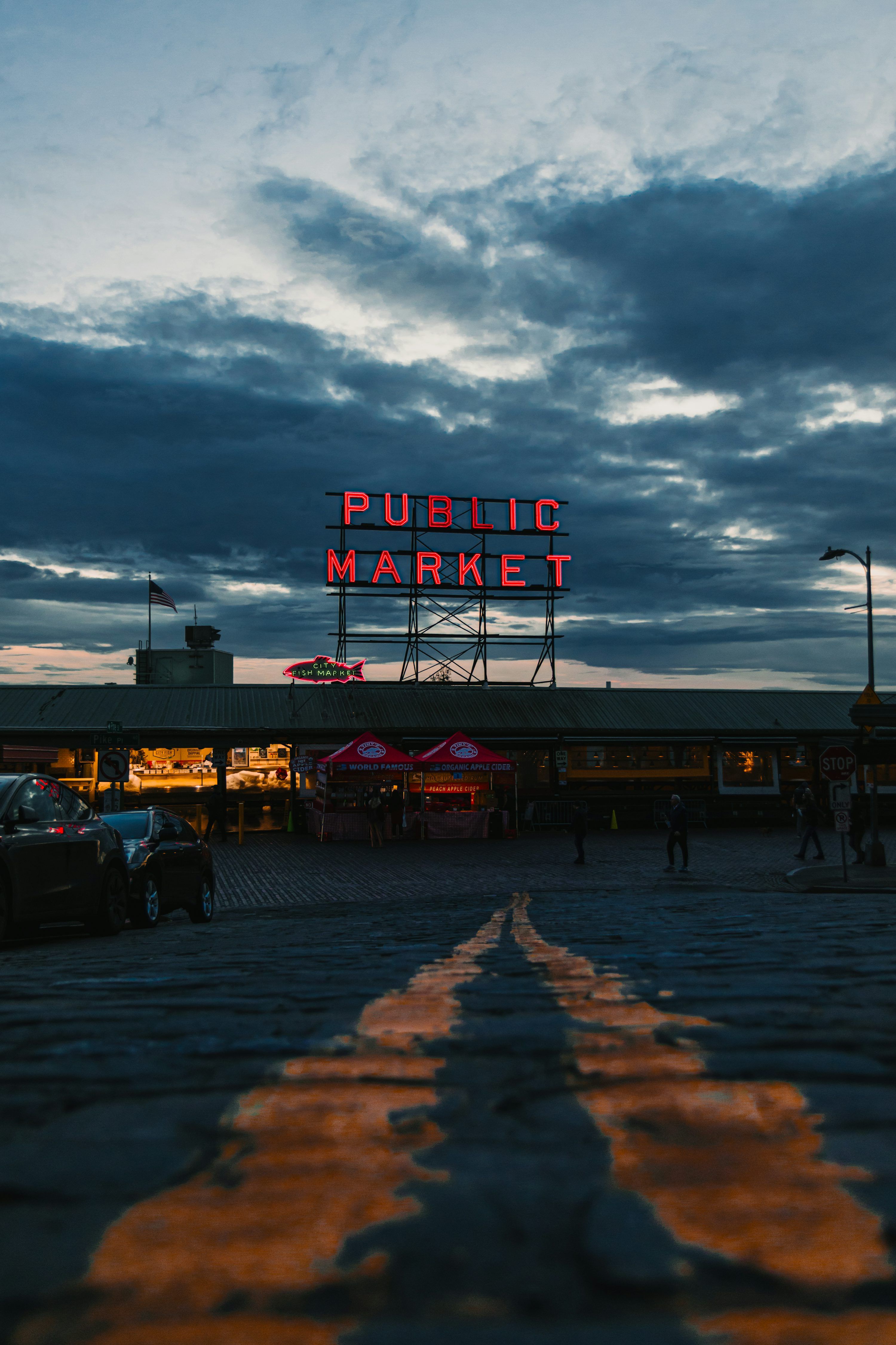 3000x4504 Public market sign illuminated at dusk with cloudy sky