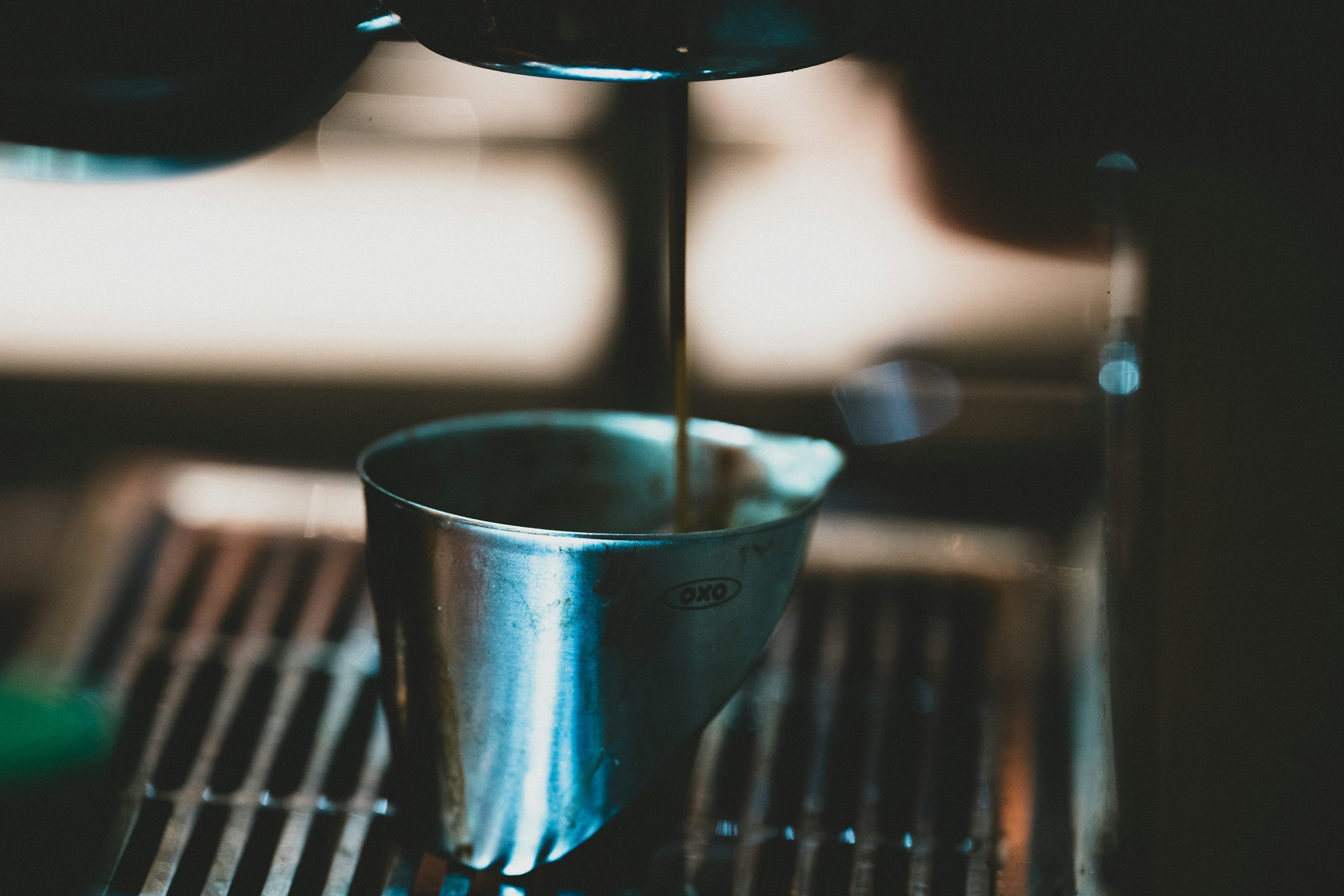 3000x2000 Espresso pouring into a metal cup