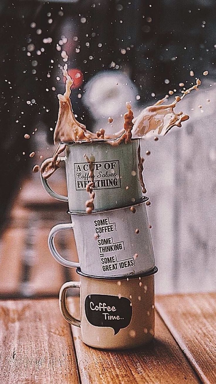 736x1307 Two Stacked Coffee Mugs With Pouring Liquid. Books and tea, Community coffee, Coffee facts
