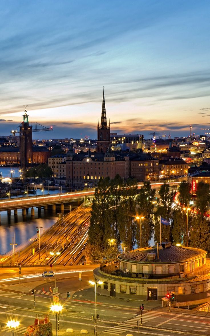 736x1177 Wallpaper stockholm evening sweden lights of the city