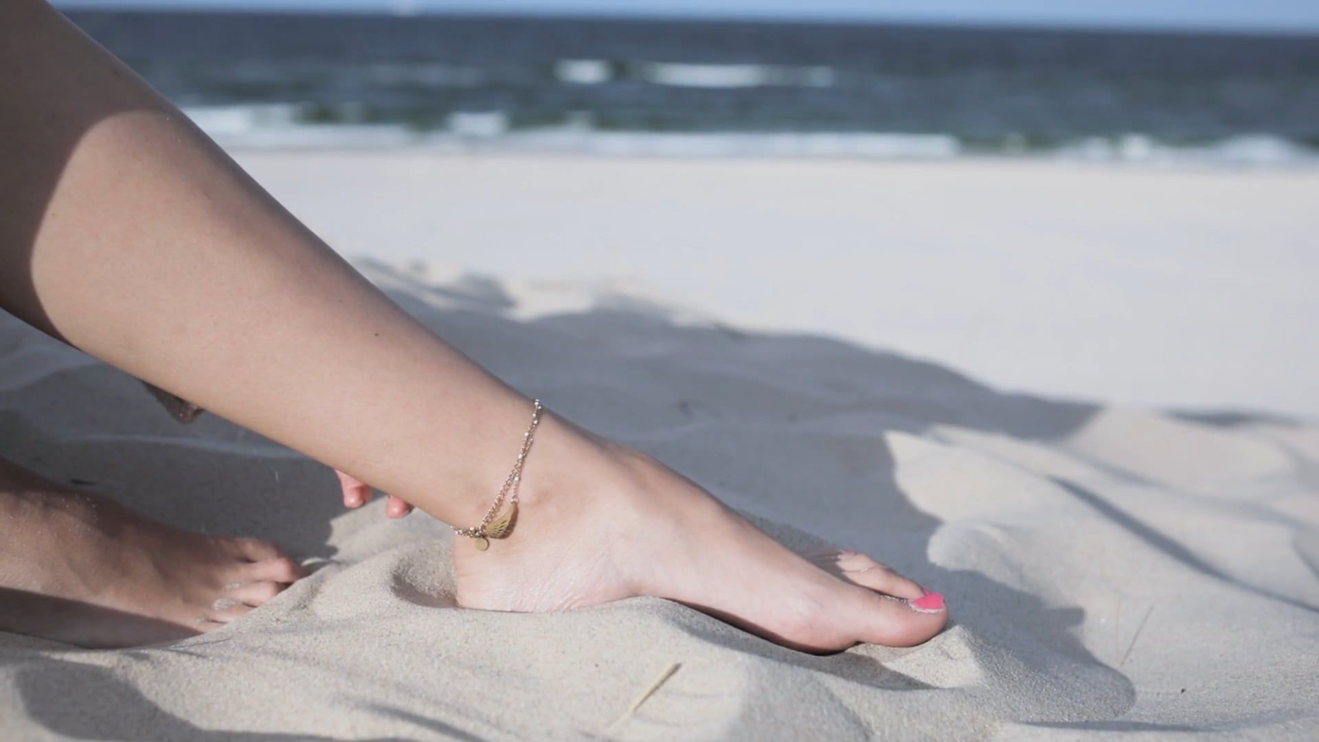 1920x1080 A Person Touching Anklet Free Stock Video Footage, Royalty Free 4K & HD Video Clip