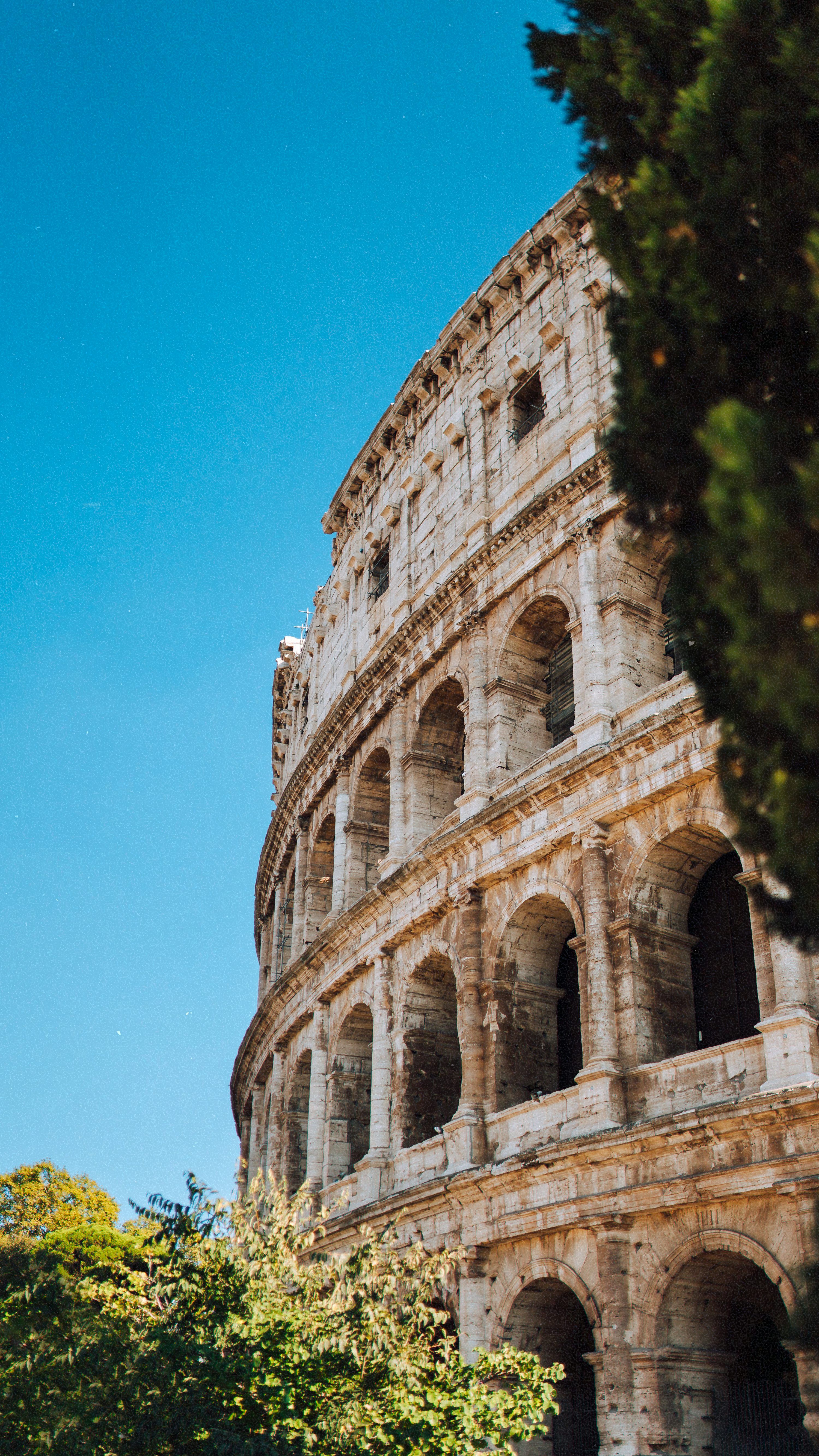 3000x5331 A tall stone building