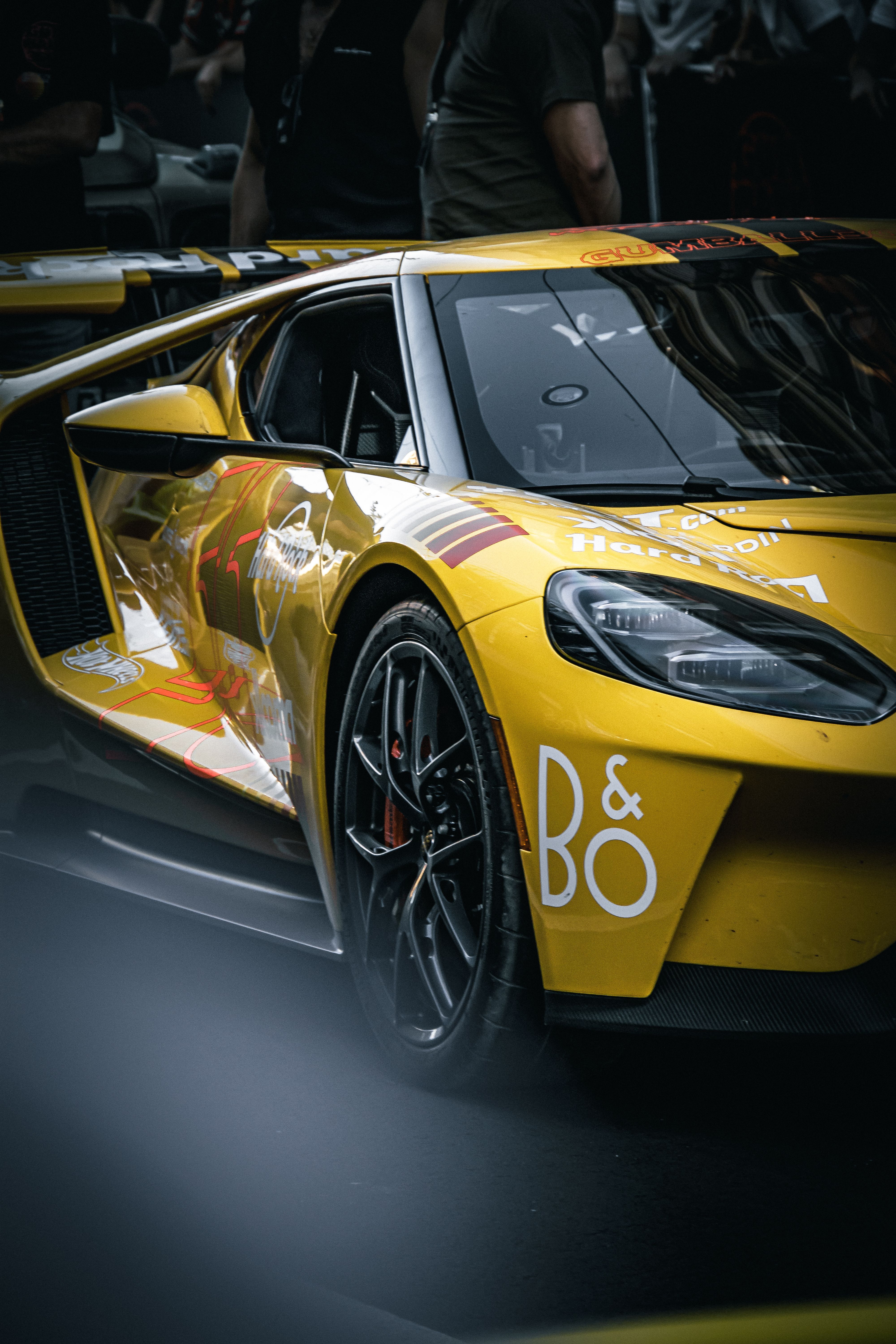 4000x6000 Vibrant Yellow Sports Car at Night Race · Free