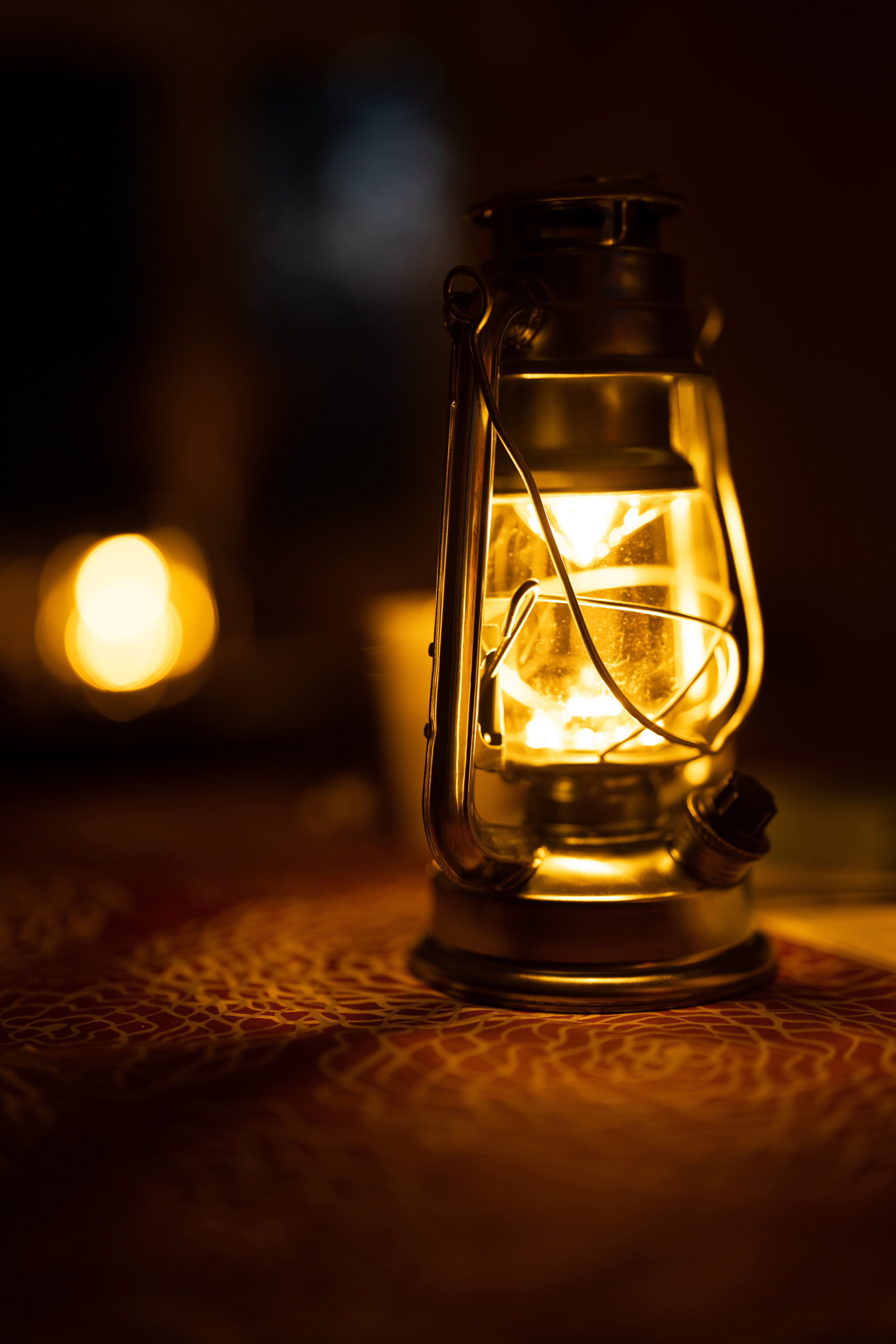 4096x6144 Download wallpaper 4096x6144 lamp, lighting, light, yellow, dark HD background