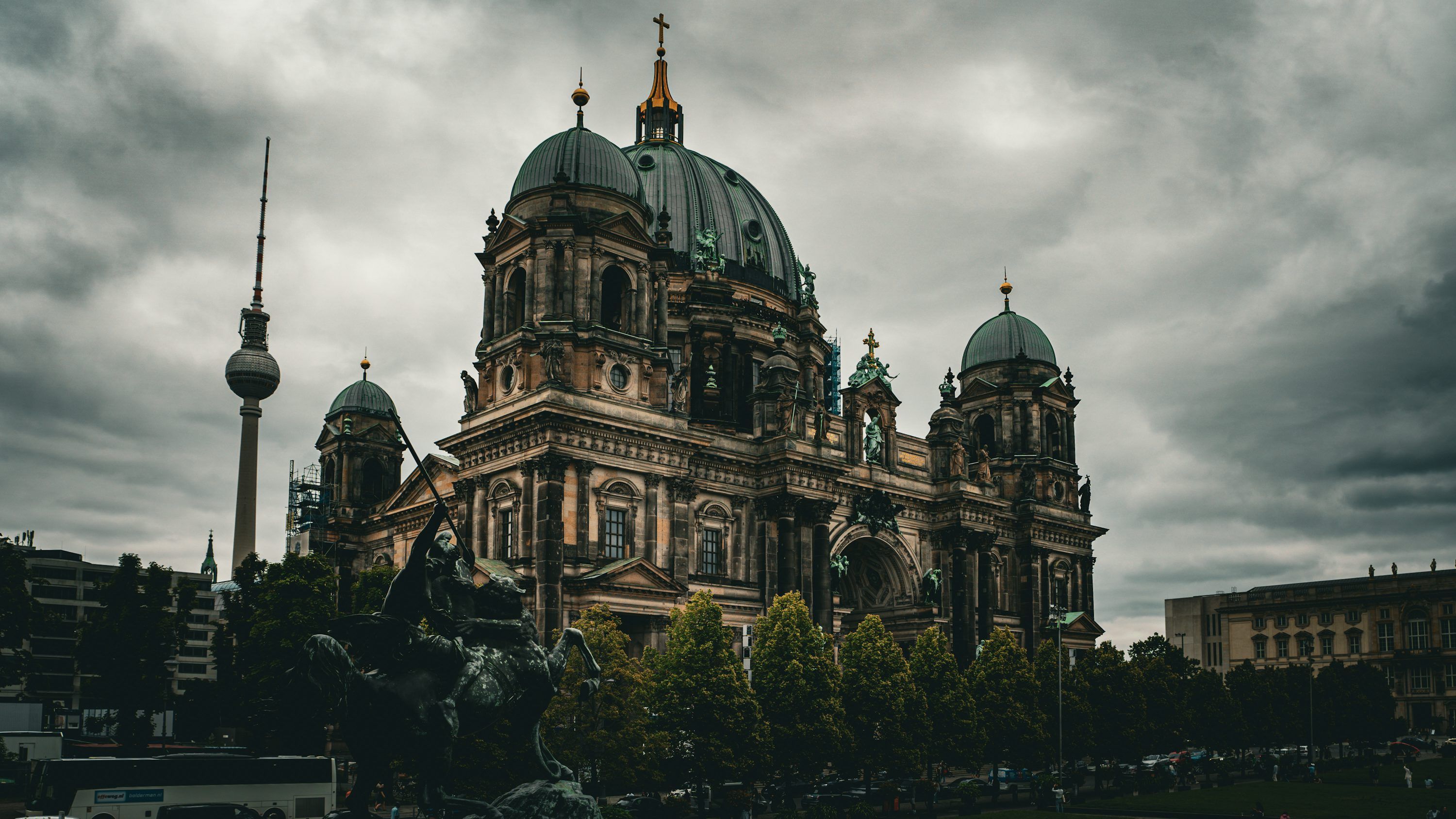 3000x1688 Berlin cathedral and TV tower under cloudy sky