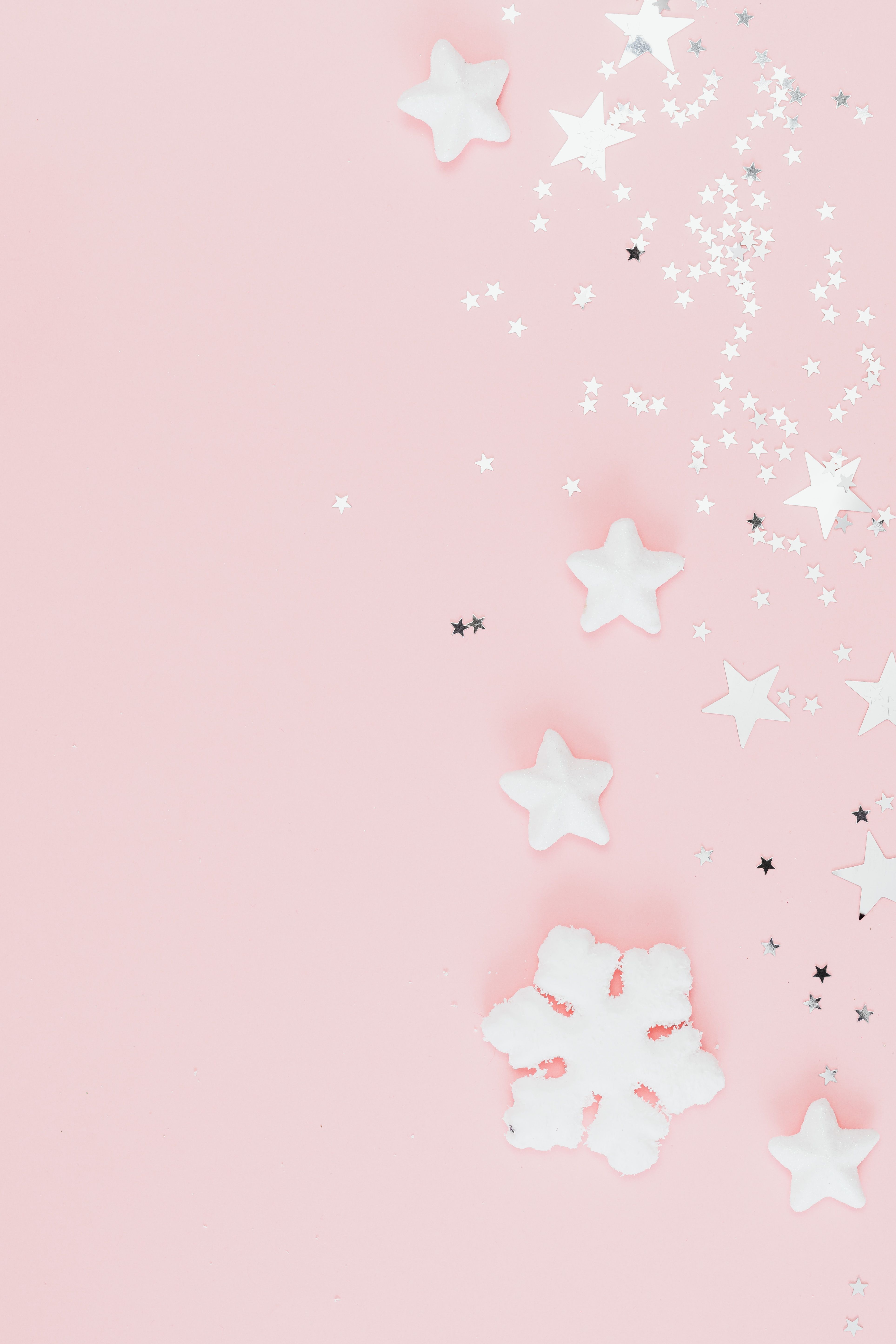 3853x5779 Close Up Shot Of White Stars On A Pink Surface · Free