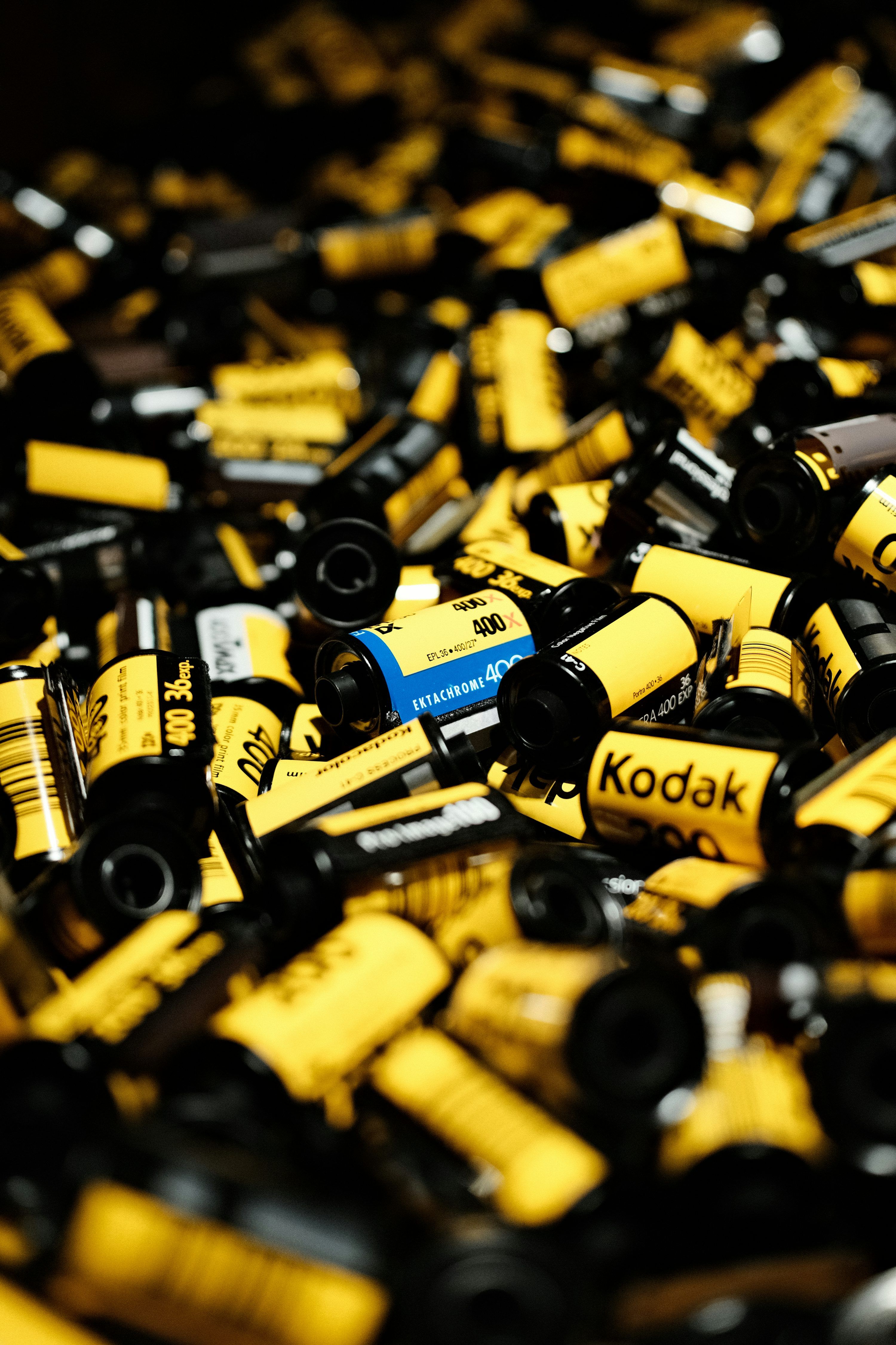 3000x4500 A pile of old kodak film canisters