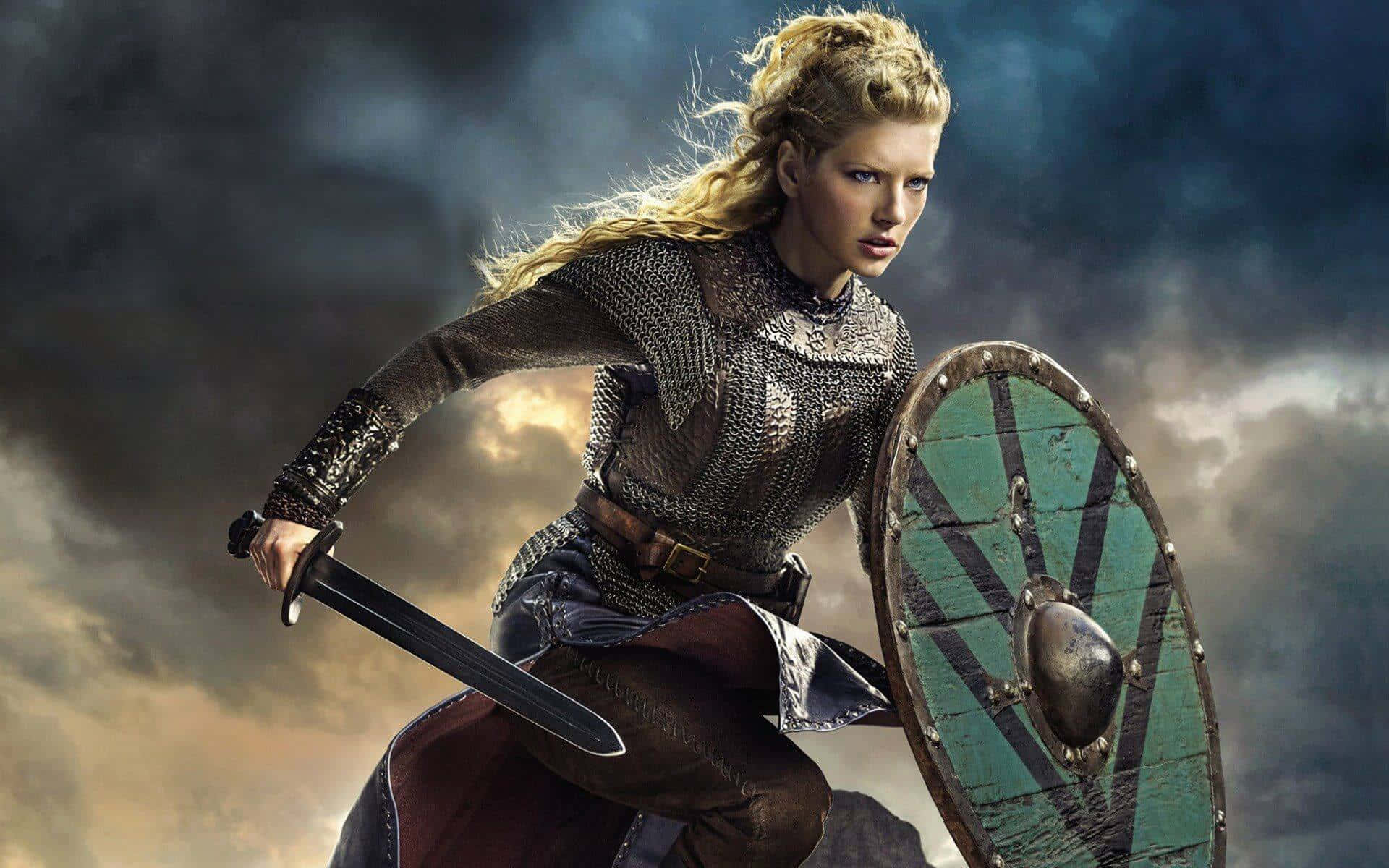 1920x1200 Download A female Viking Warrior stands ready to defend against enemies. Picture