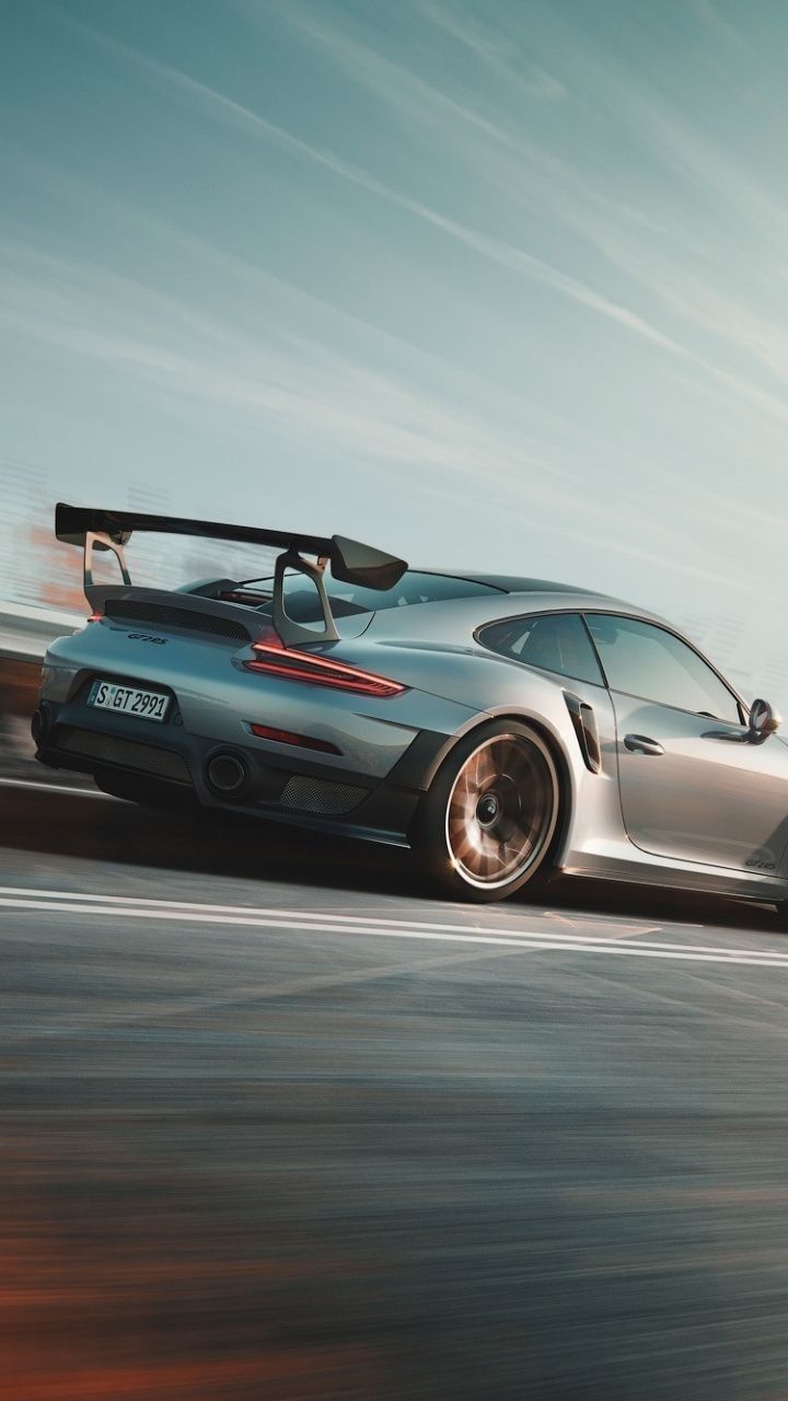 720x1280 Fast car blur. Gt2 rs wallpaper iphone, Two sports cars racing on a road, Exotic cars